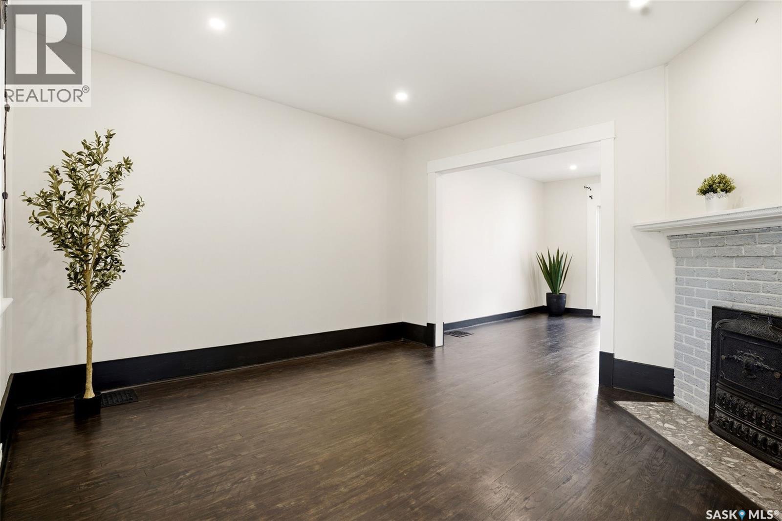 721 College Avenue, Regina, SK - Indoor Photo Showing Other Room With Fireplace