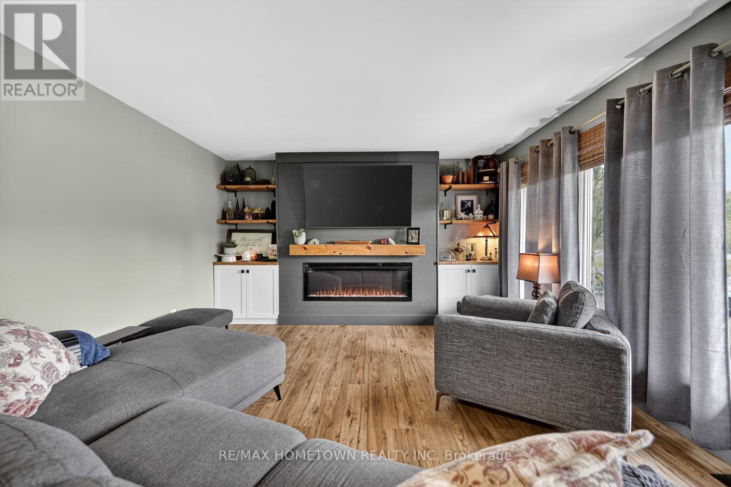 6244 Sixth Concession, Augusta, ON - Indoor Photo Showing Living Room With Fireplace