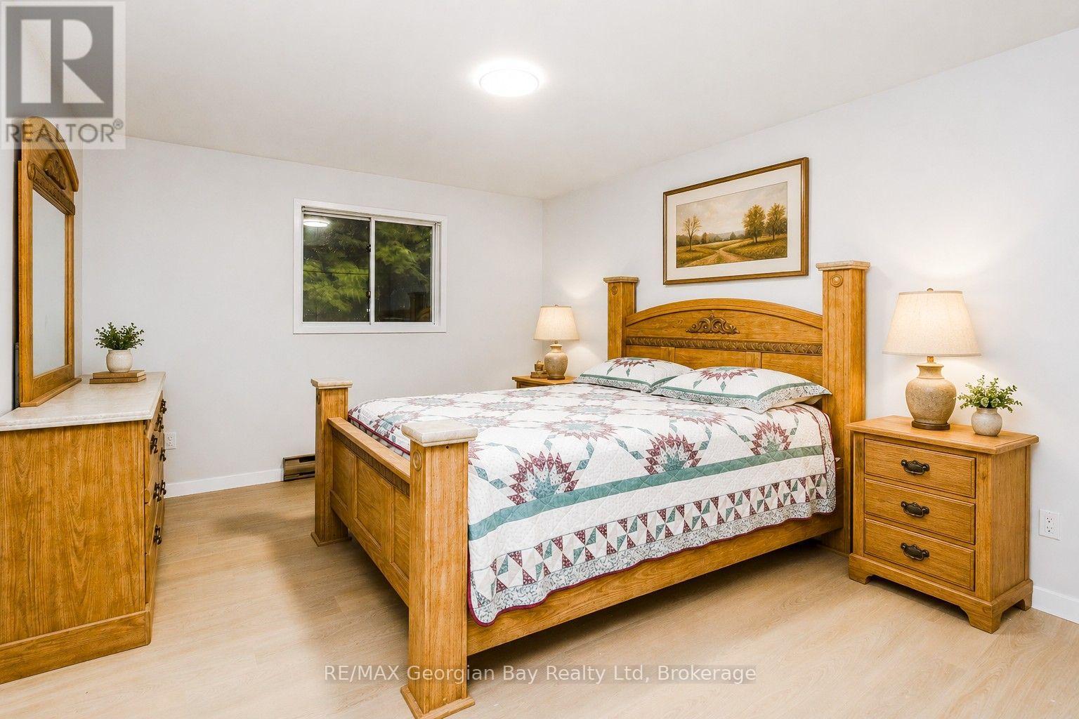 Primary Bedroom - Virtually Furnished - 25 Albert Avenue, Tiny, ON - Indoor Photo Showing Bedroom