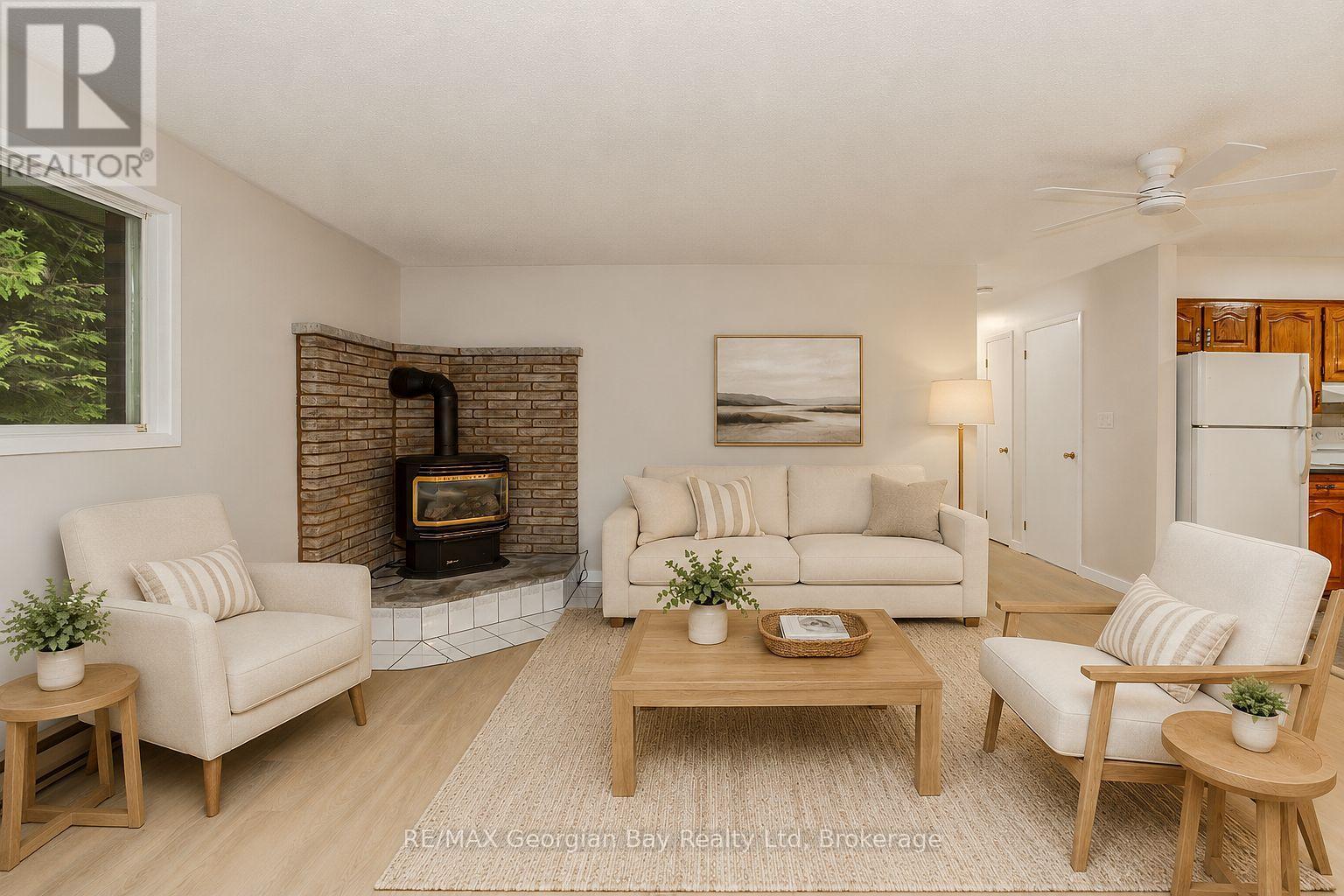 Living Rm - Virtually Furnished - 25 Albert Avenue, Tiny, ON - Indoor Photo Showing Living Room With Fireplace
