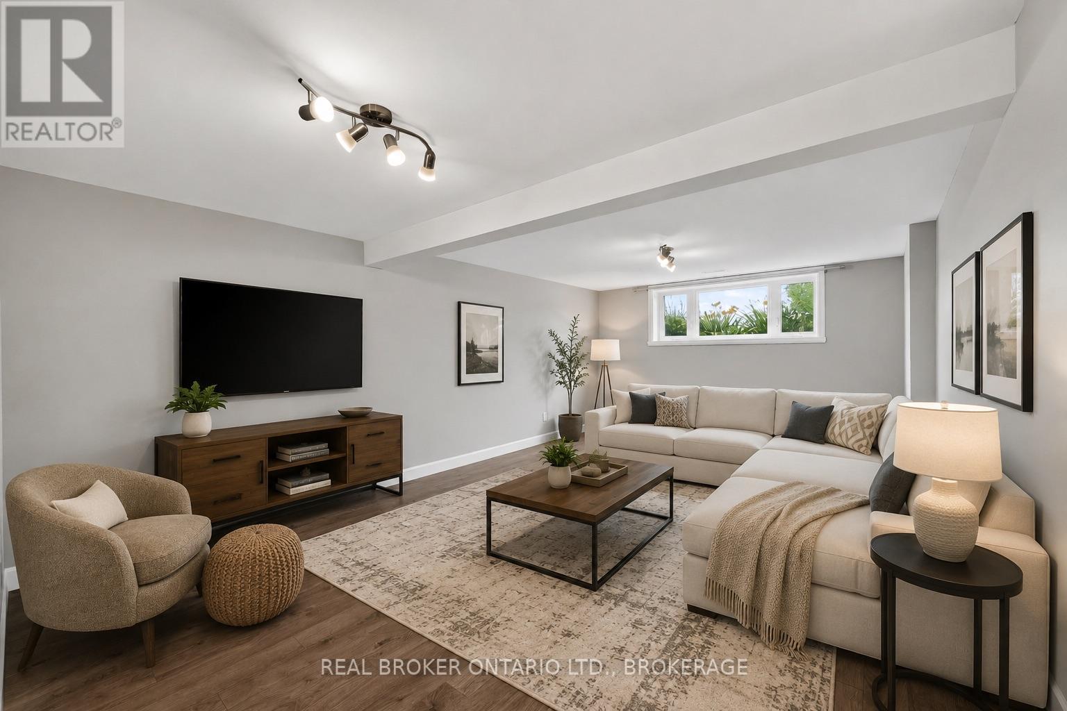 Photo has been virtually staged - 2199 Burke Avenue, Cornwall, ON - Indoor Photo Showing Living Room