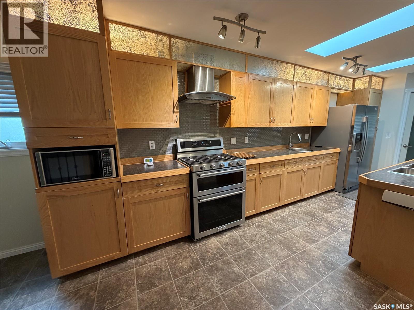 509 Mark Avenue, Moosomin, SK - Indoor Photo Showing Kitchen With Double Sink