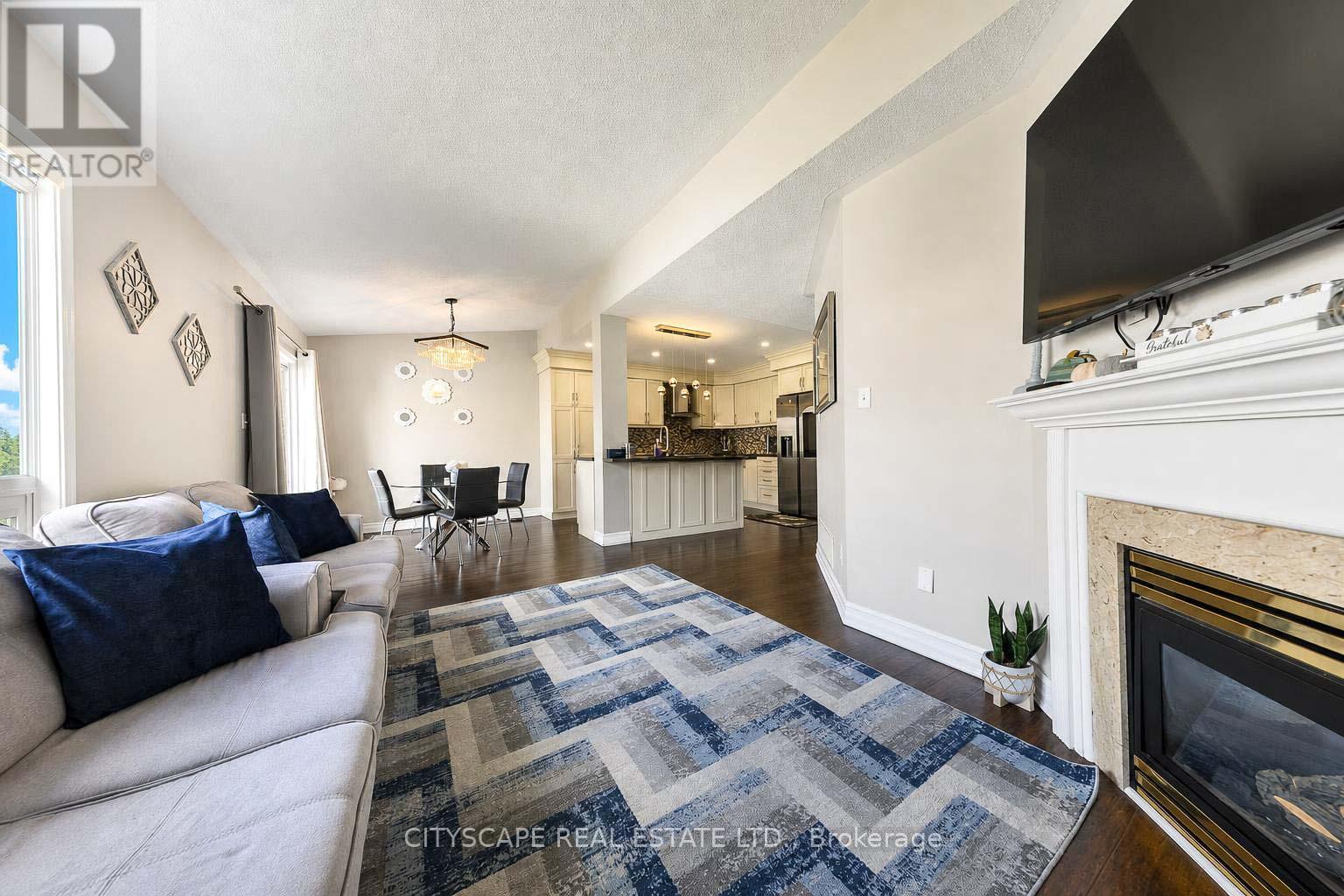 764 Avocado Crescent, Mississauga, ON - Indoor Photo Showing Living Room With Fireplace