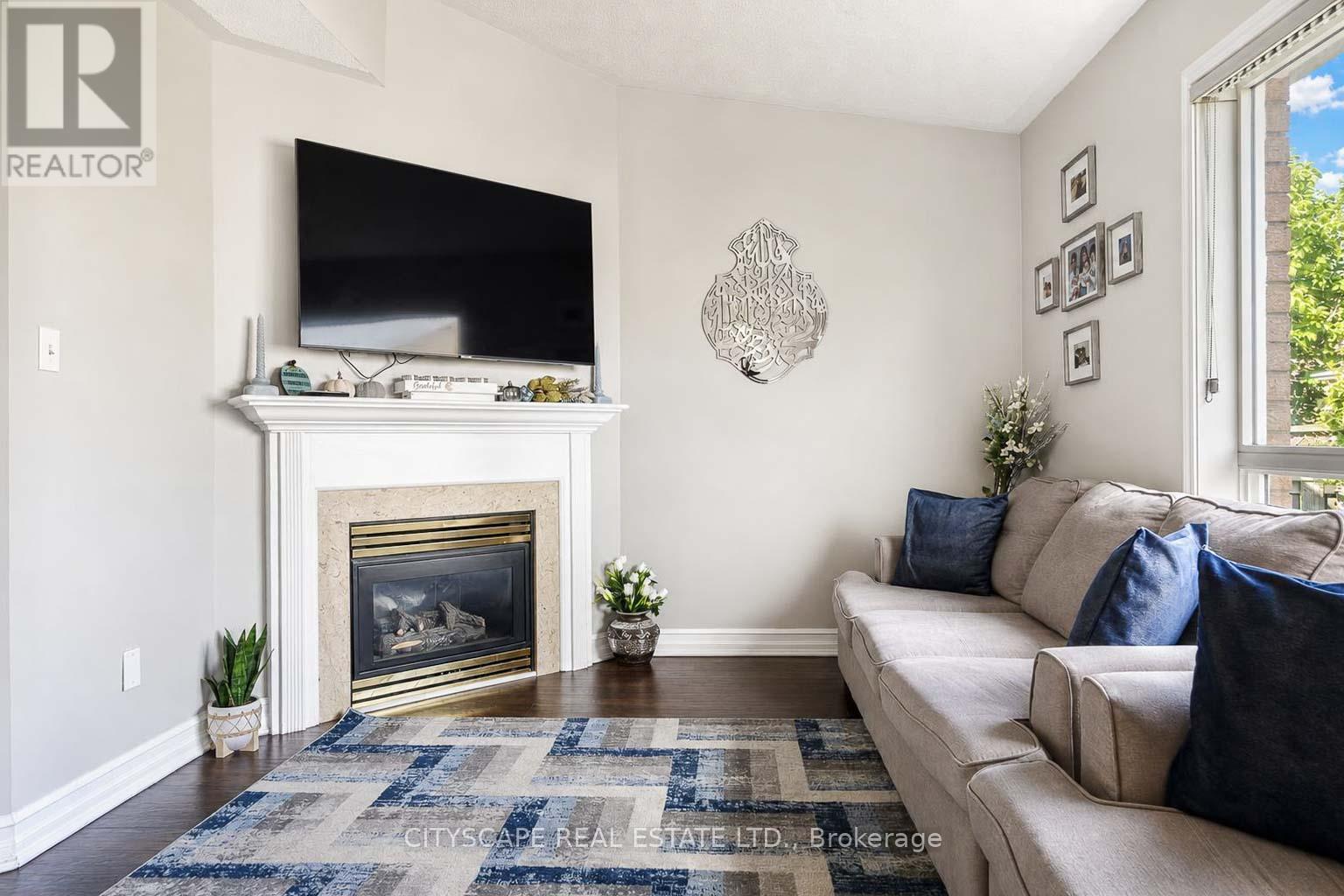 764 Avocado Crescent, Mississauga, ON - Indoor Photo Showing Living Room With Fireplace