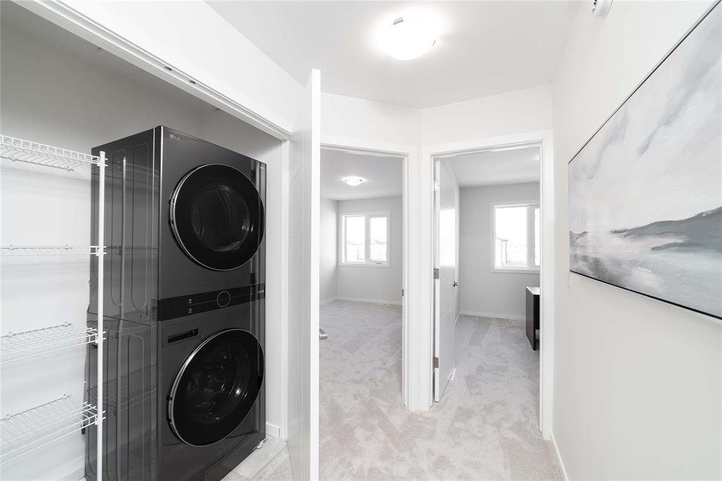 77 Ken Oblik Drive, Winnipeg, MB - Indoor Photo Showing Laundry Room