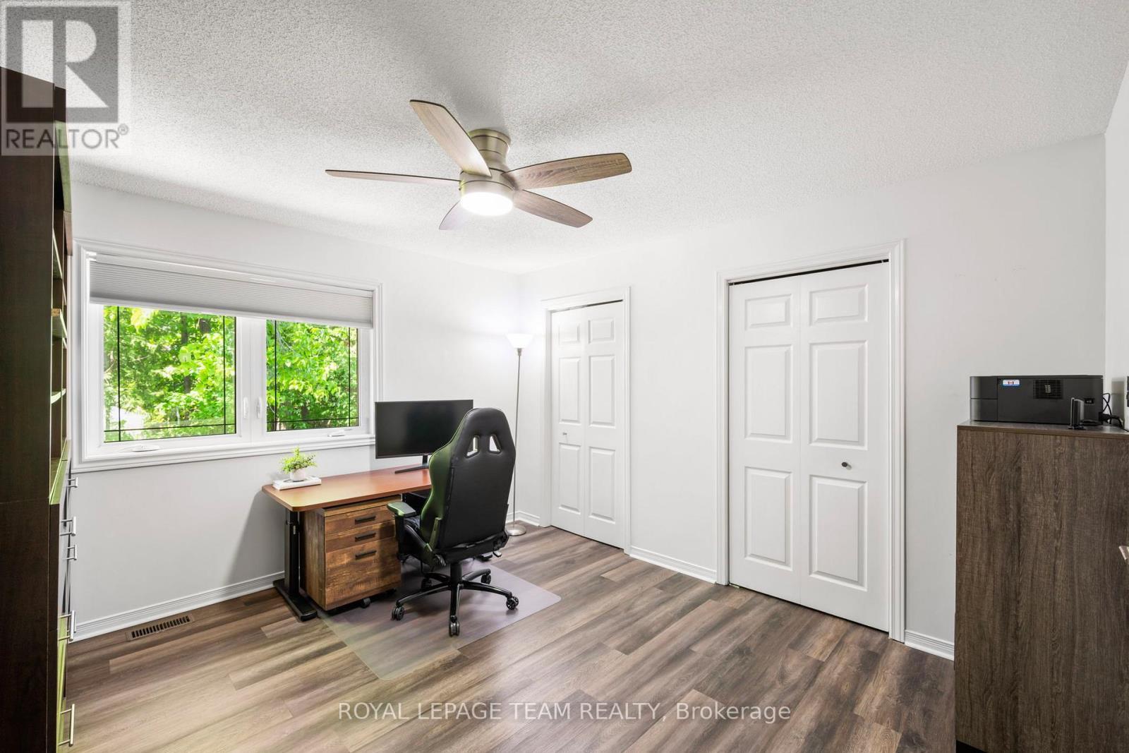 Bedroom 2 with 2 large closets, tree views - 212 Provender Avenue, Ottawa, ON - Indoor