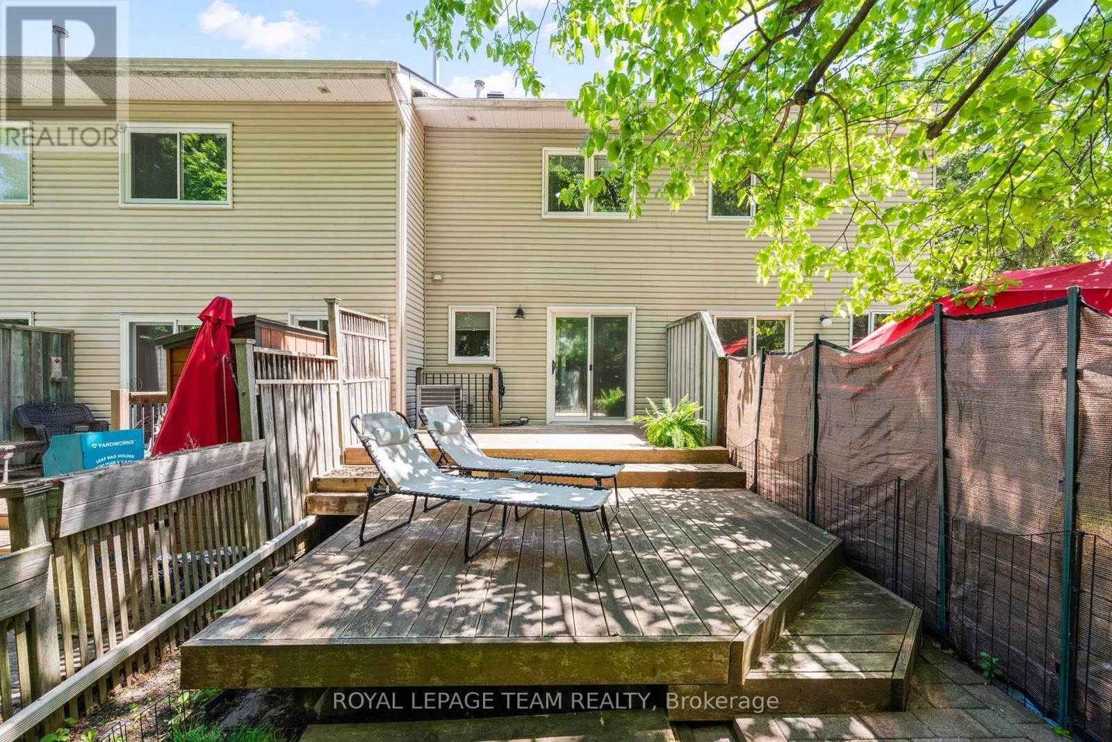 Walk out from kitchen to tiered deck - 212 Provender Avenue, Ottawa, ON - Outdoor With Deck Patio Veranda With Exterior