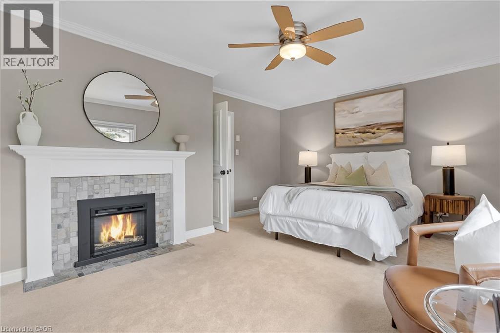 203 Forsyth Drive, Waterloo, ON - Indoor Photo Showing Bedroom With Fireplace