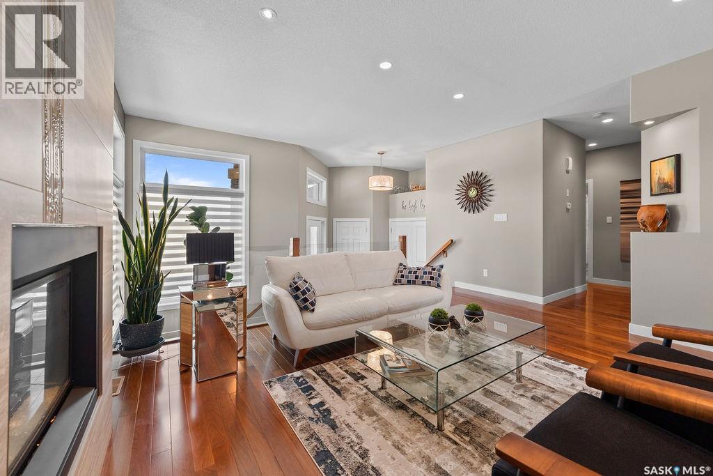 4110 Chuka Drive, Regina, SK - Indoor Photo Showing Living Room With Fireplace