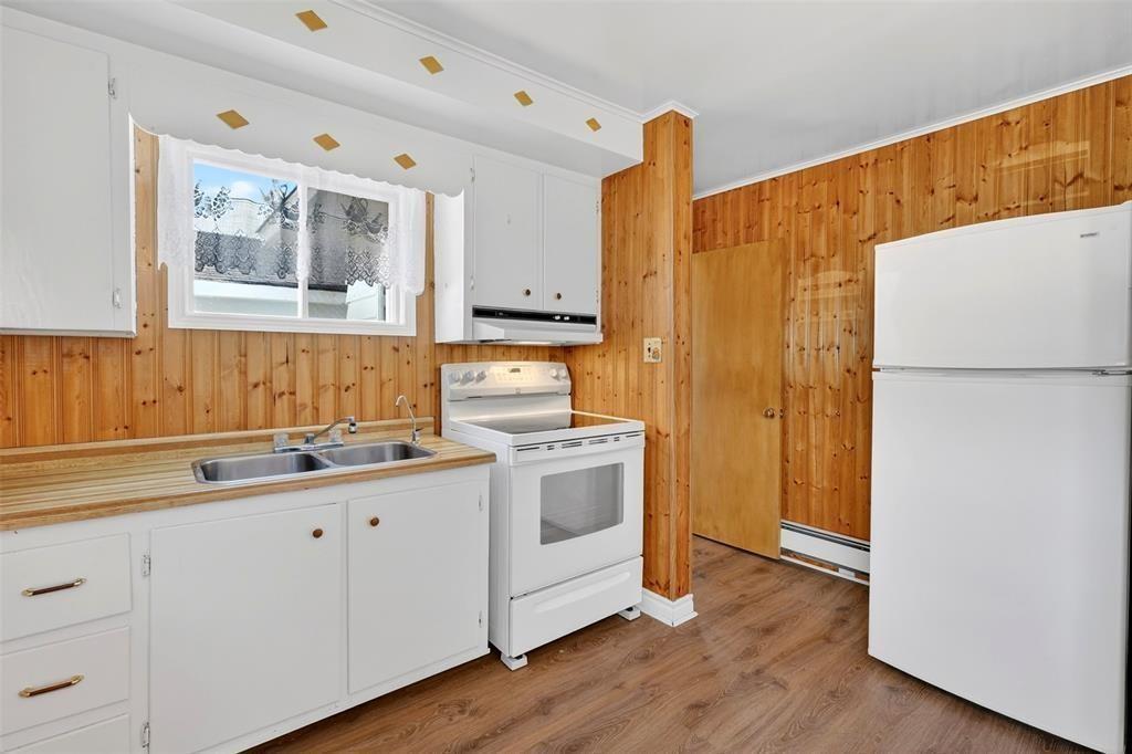 12-14 Barnes Road, Bay Roberts, NL - Indoor Photo Showing Kitchen With Double Sink