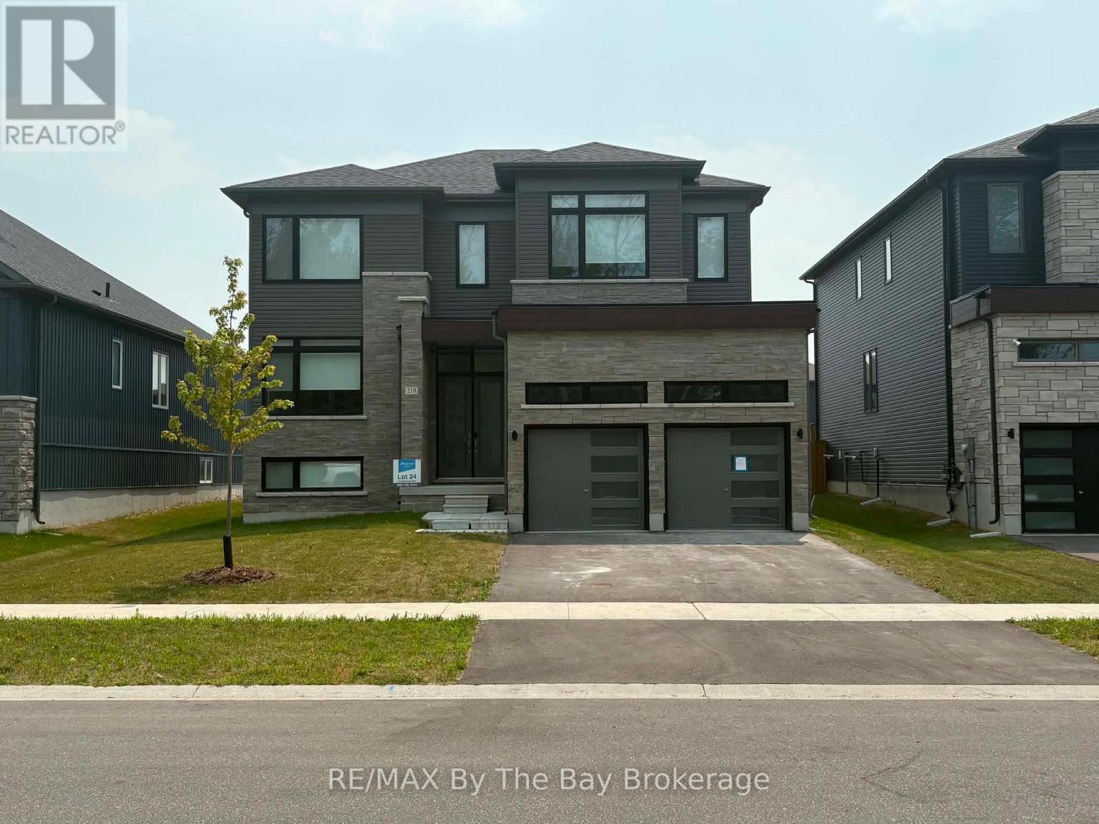 Upper Unit - 218 Mapleside Drive, Wasaga Beach, ON - Outdoor With Facade