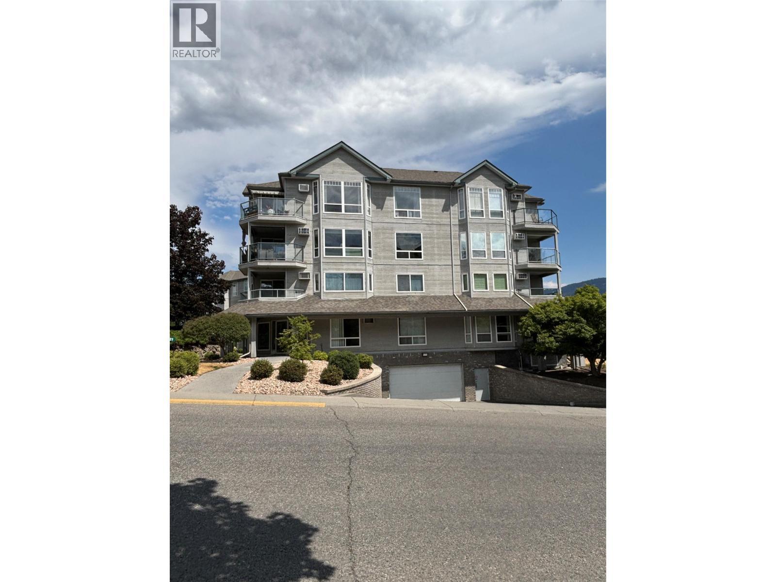 3221 Centennial Drive Unit# 401, Vernon, BC - Outdoor With Balcony With Facade