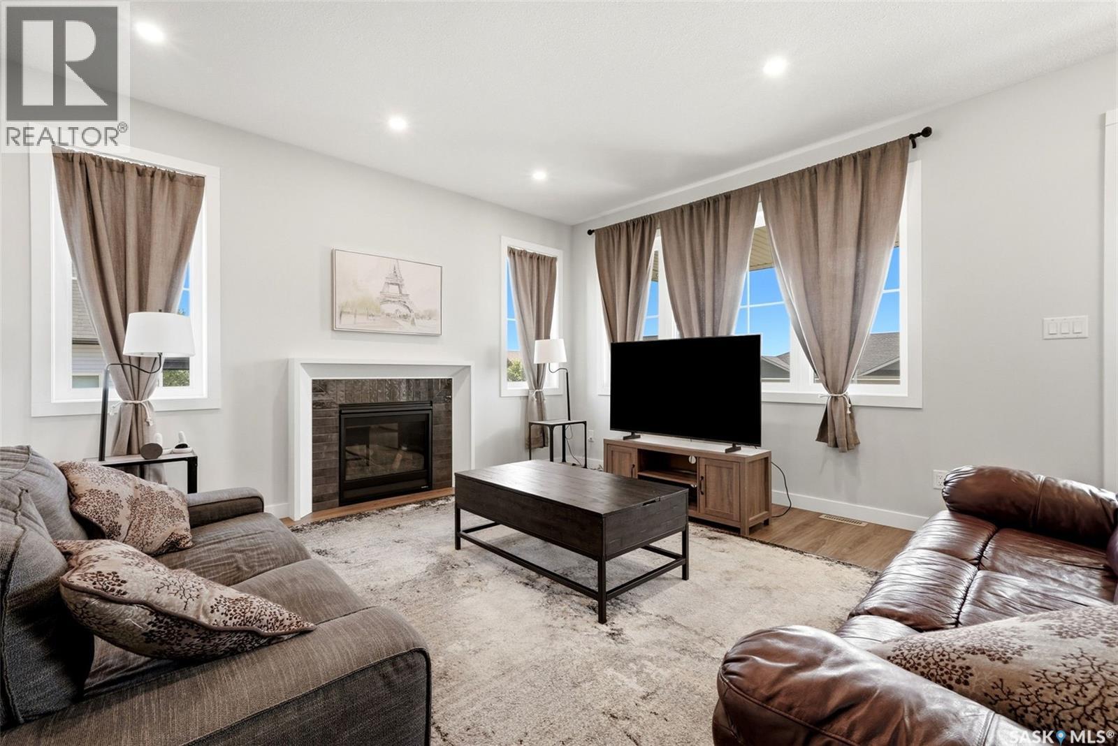 25 Aaron Drive, Echo Lake, SK - Indoor Photo Showing Living Room With Fireplace