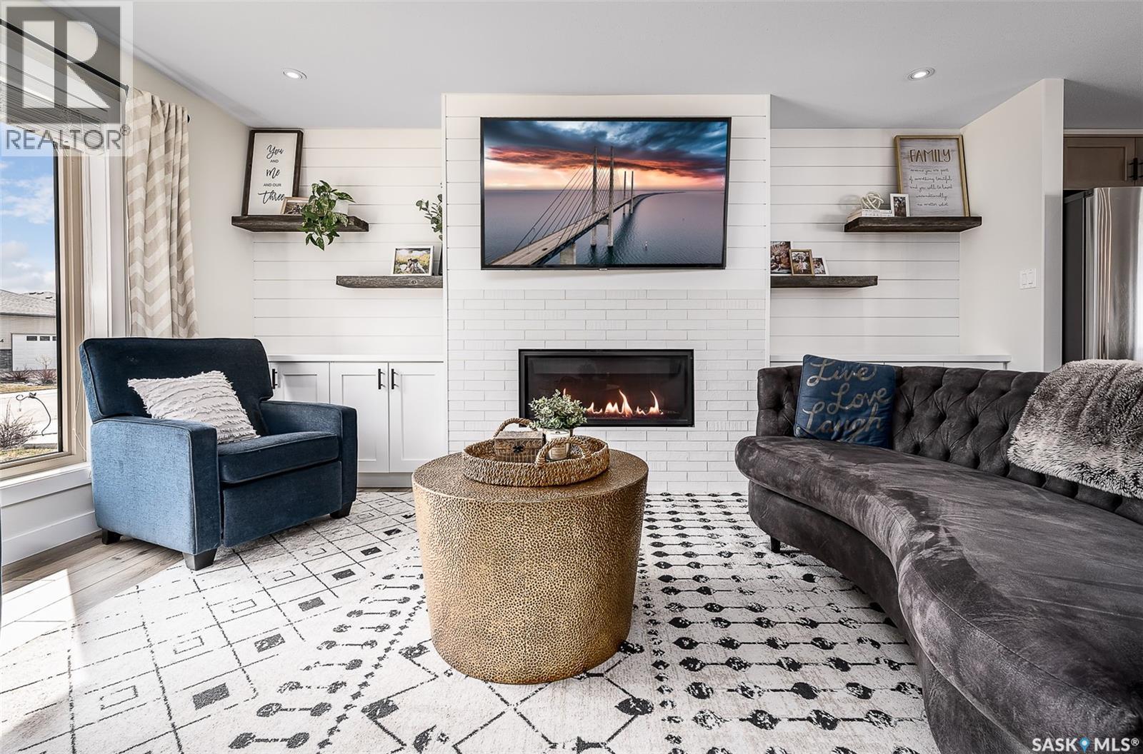 123 Hodges Crescent, Moose Jaw, SK - Indoor Photo Showing Living Room With Fireplace
