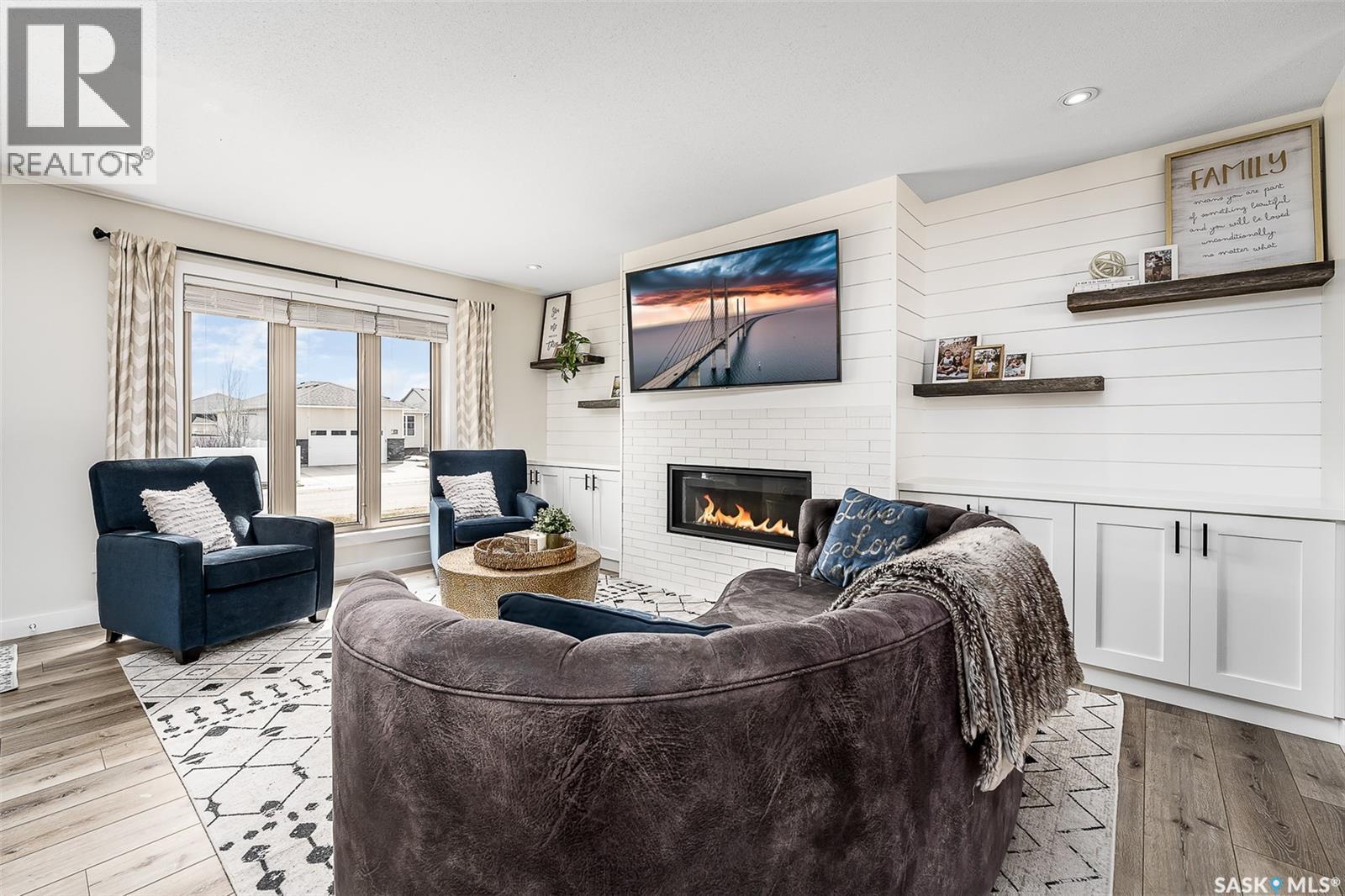 123 Hodges Crescent, Moose Jaw, SK - Indoor Photo Showing Living Room With Fireplace