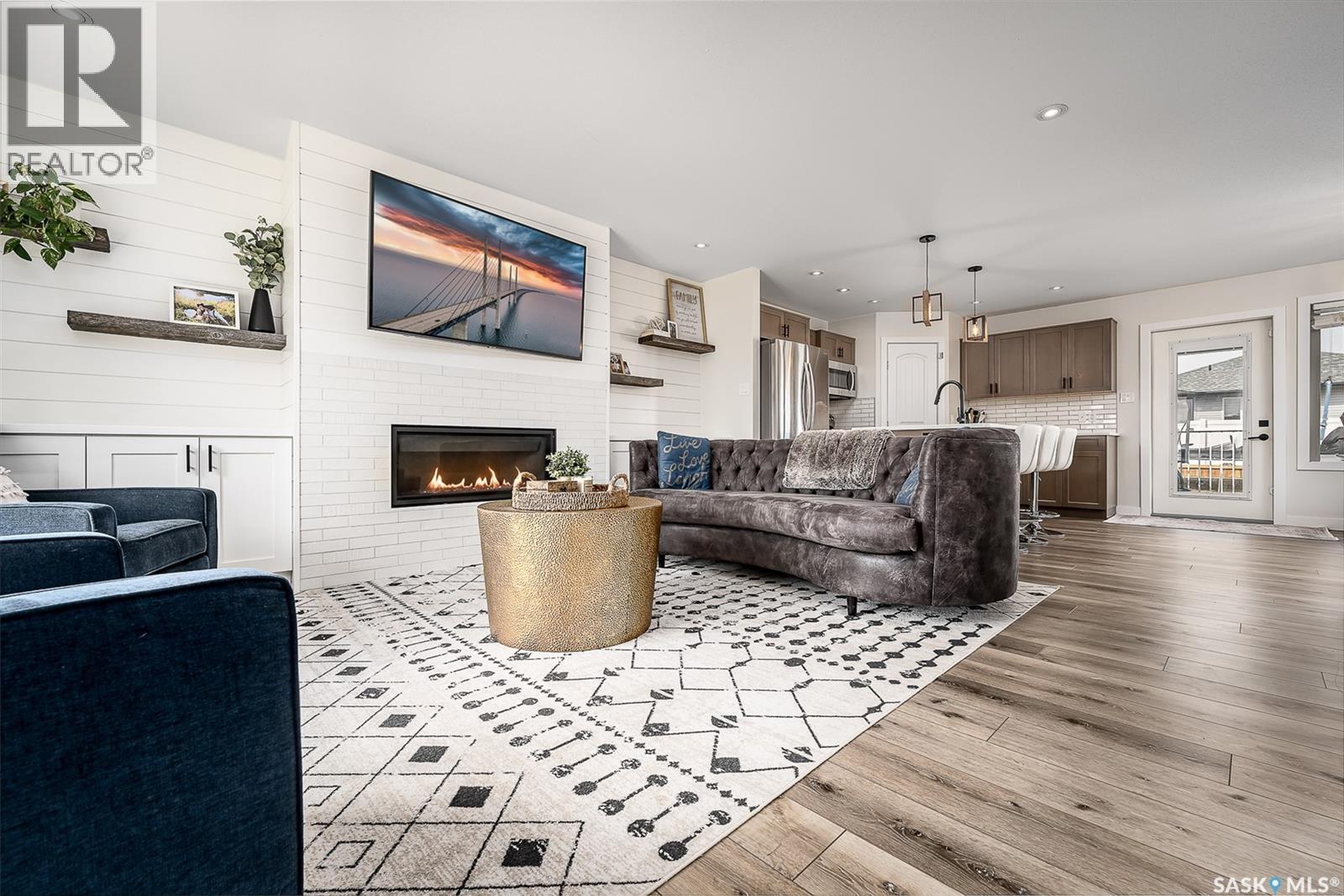 123 Hodges Crescent, Moose Jaw, SK - Indoor Photo Showing Living Room With Fireplace