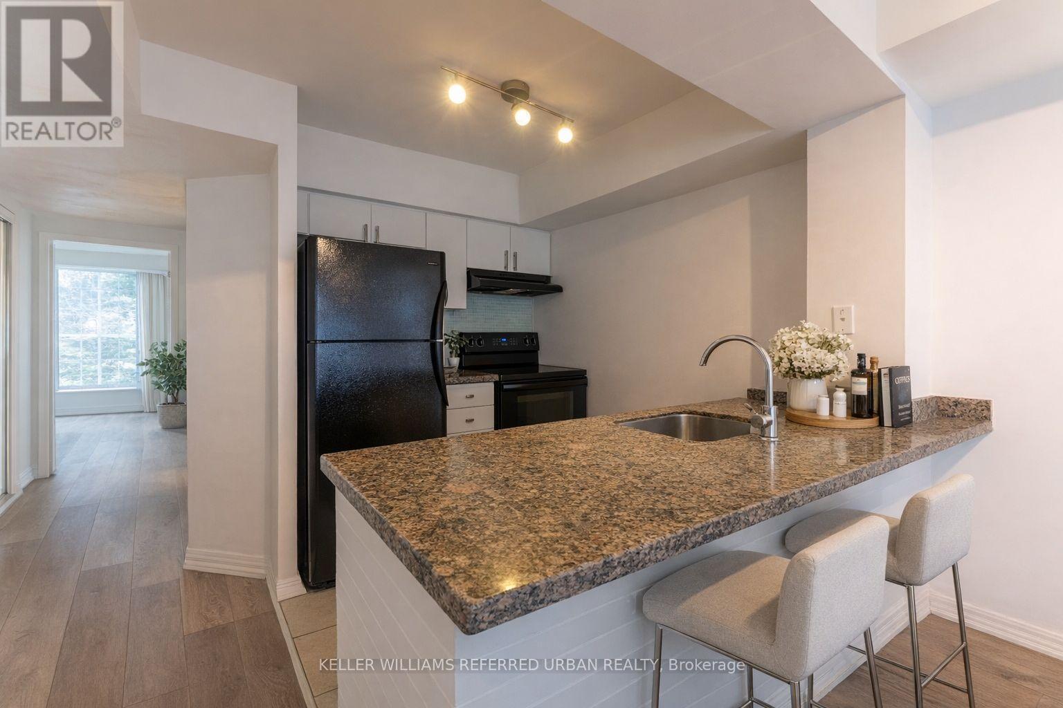 Kitchen (virtually staged) - 651 - 3 Everson Drive, Toronto, ON - Indoor Photo Showing Kitchen
