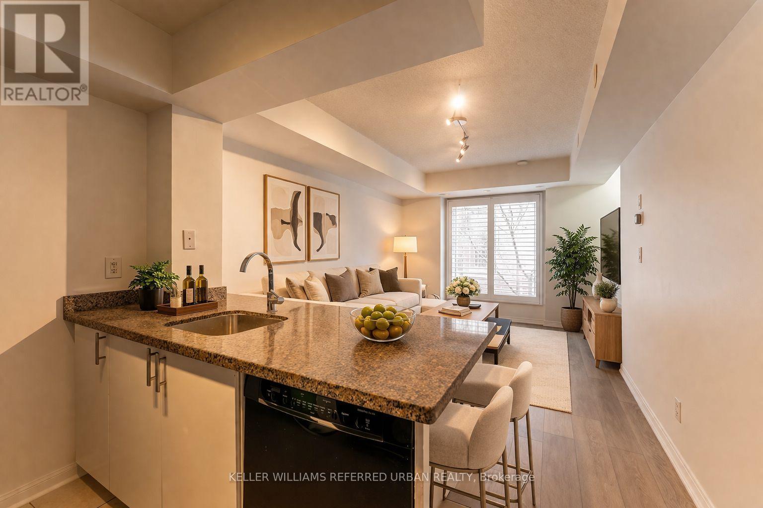 Kitchen and Living Room (virtually staged) - 651 - 3 Everson Drive, Toronto, ON - Indoor Photo Showing Kitchen