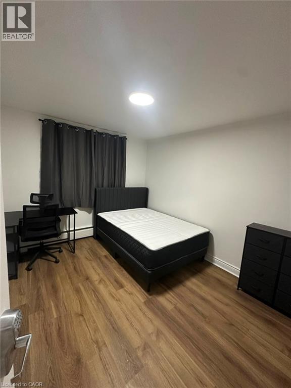 Wood-finish flooring throughout - 145 Macgregor Crescent Unit# 8 (R1), Waterloo, ON - Indoor