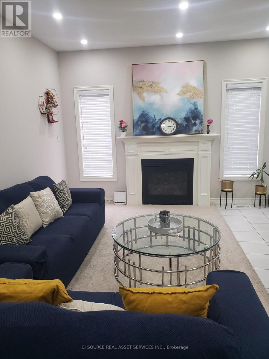 93 Sonoma Valley Crescent, Hamilton, ON - Indoor Photo Showing Living Room With Fireplace