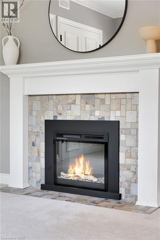 203 Forsyth Drive, Waterloo, ON - Indoor Photo Showing Living Room With Fireplace