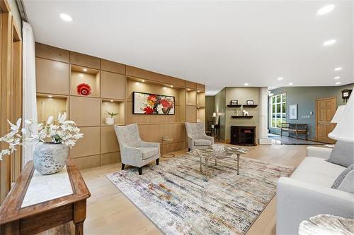 2020 Henderson Hwy, Winnipeg, MB - Indoor Photo Showing Living Room With Fireplace