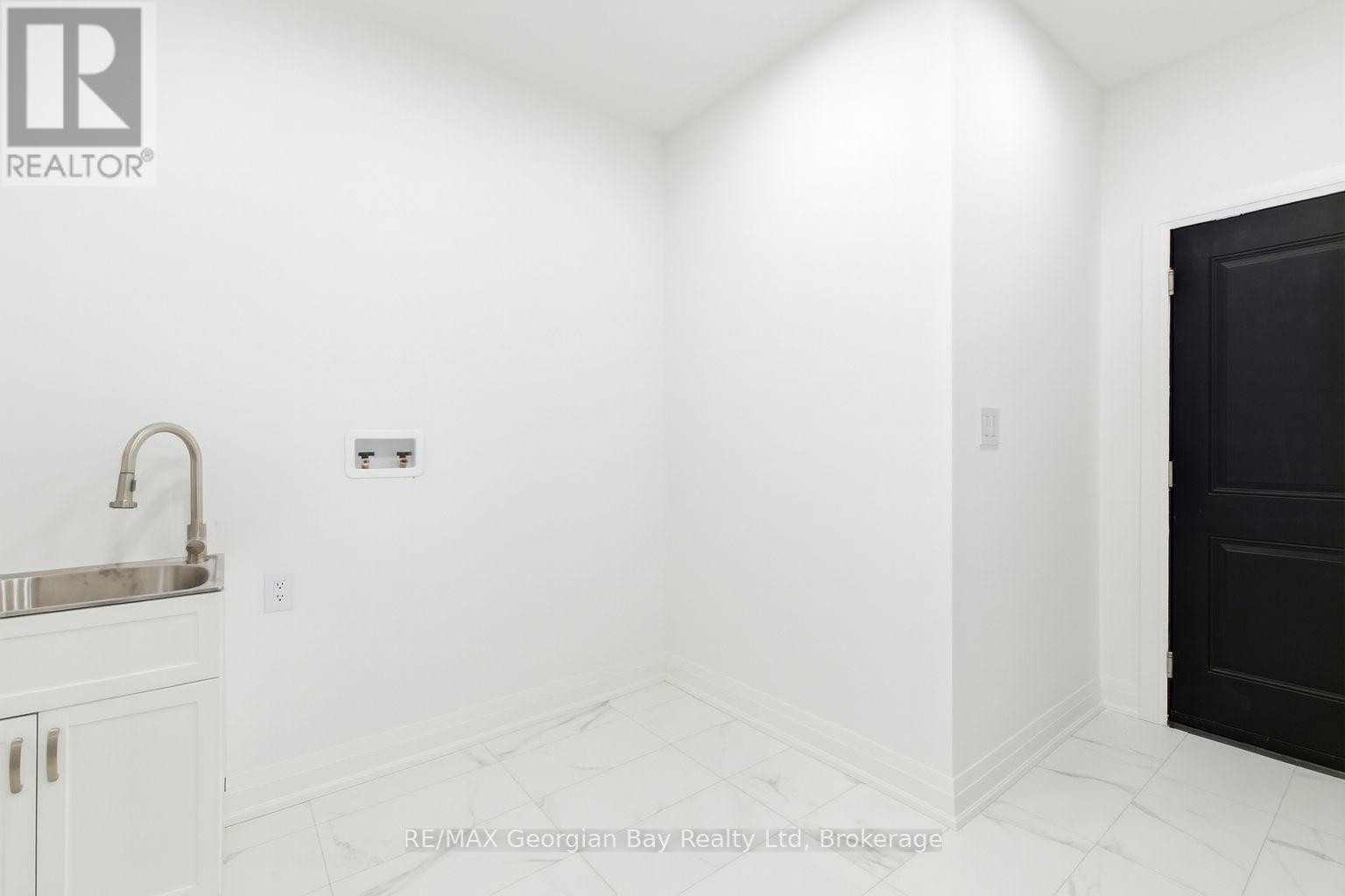 Mudroom/laundry/garage access - 49 Beaufort Crescent, Tiny, ON - Indoor