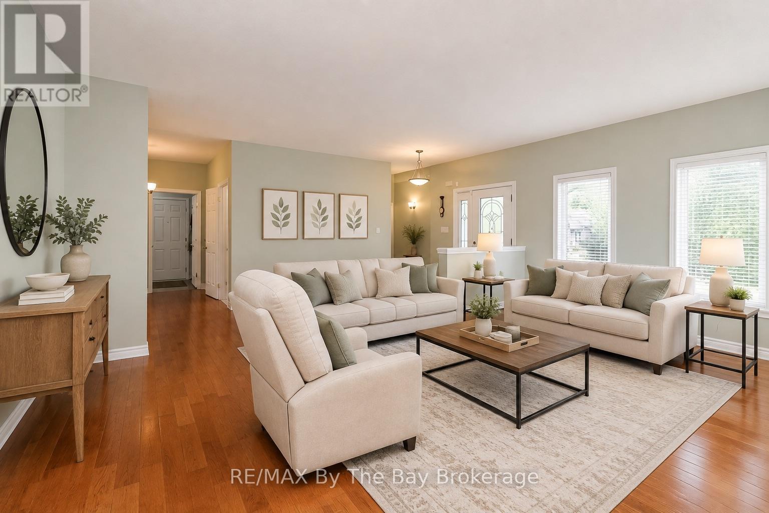 virtually staged - 60 Martyn Drive, Wasaga Beach, ON - Indoor Photo Showing Living Room