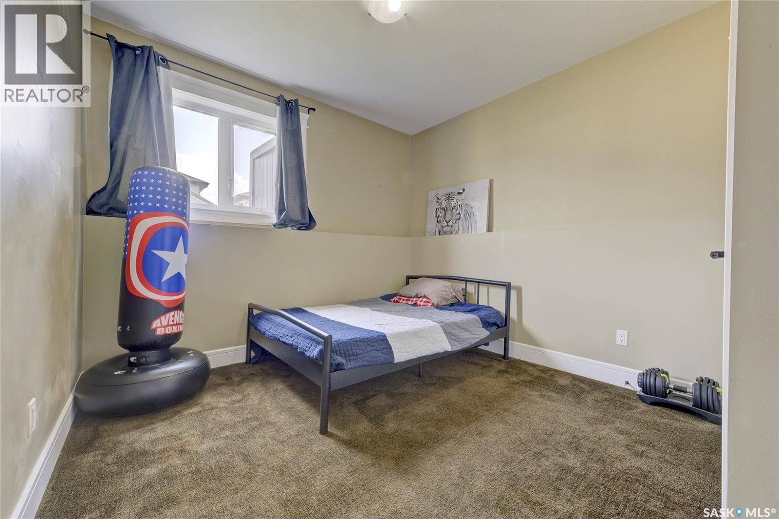 619 Maple Crescent, Warman, SK - Indoor Photo Showing Bedroom