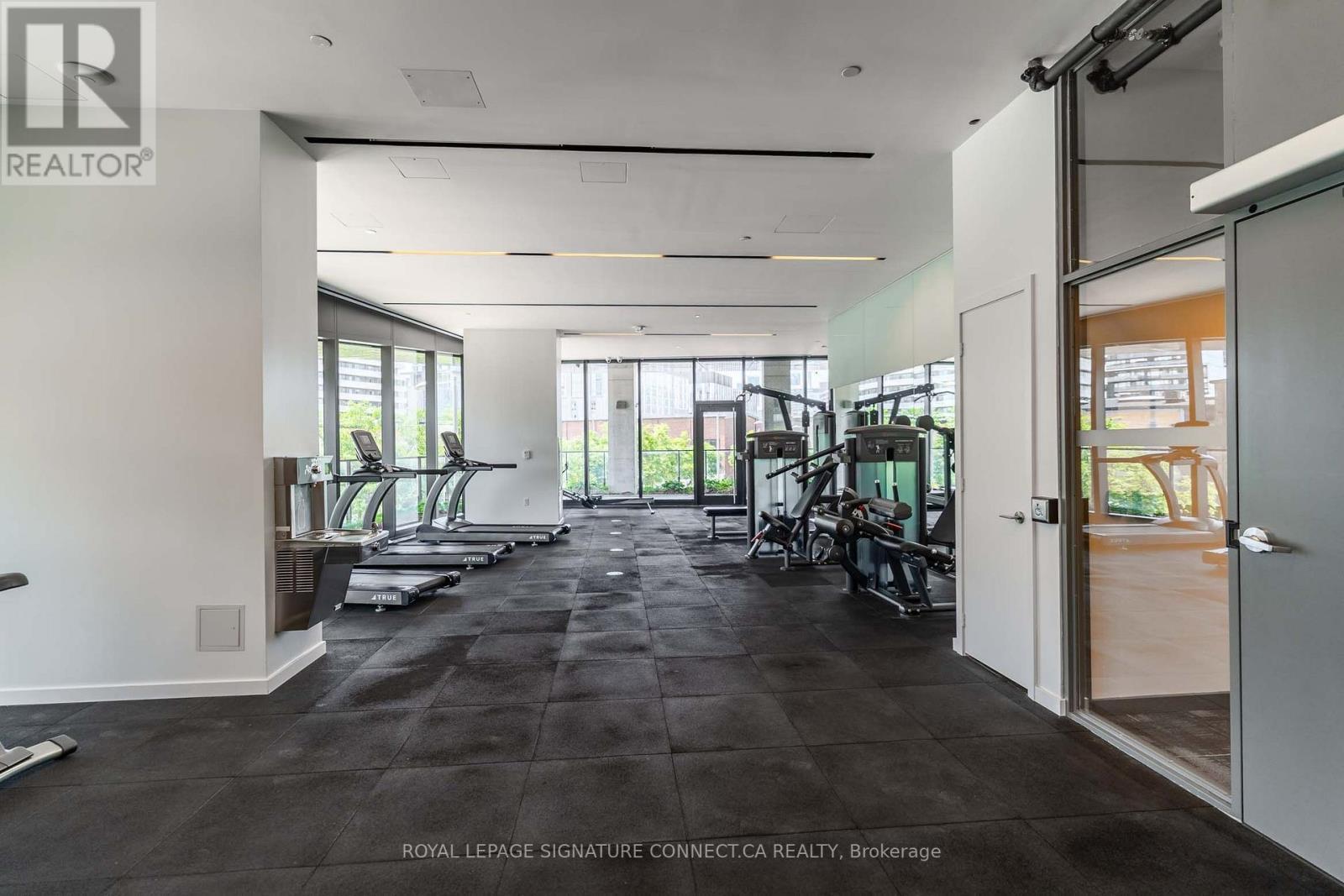 910 - 21 Lawren Harris Square, Toronto, ON - Indoor Photo Showing Gym Room