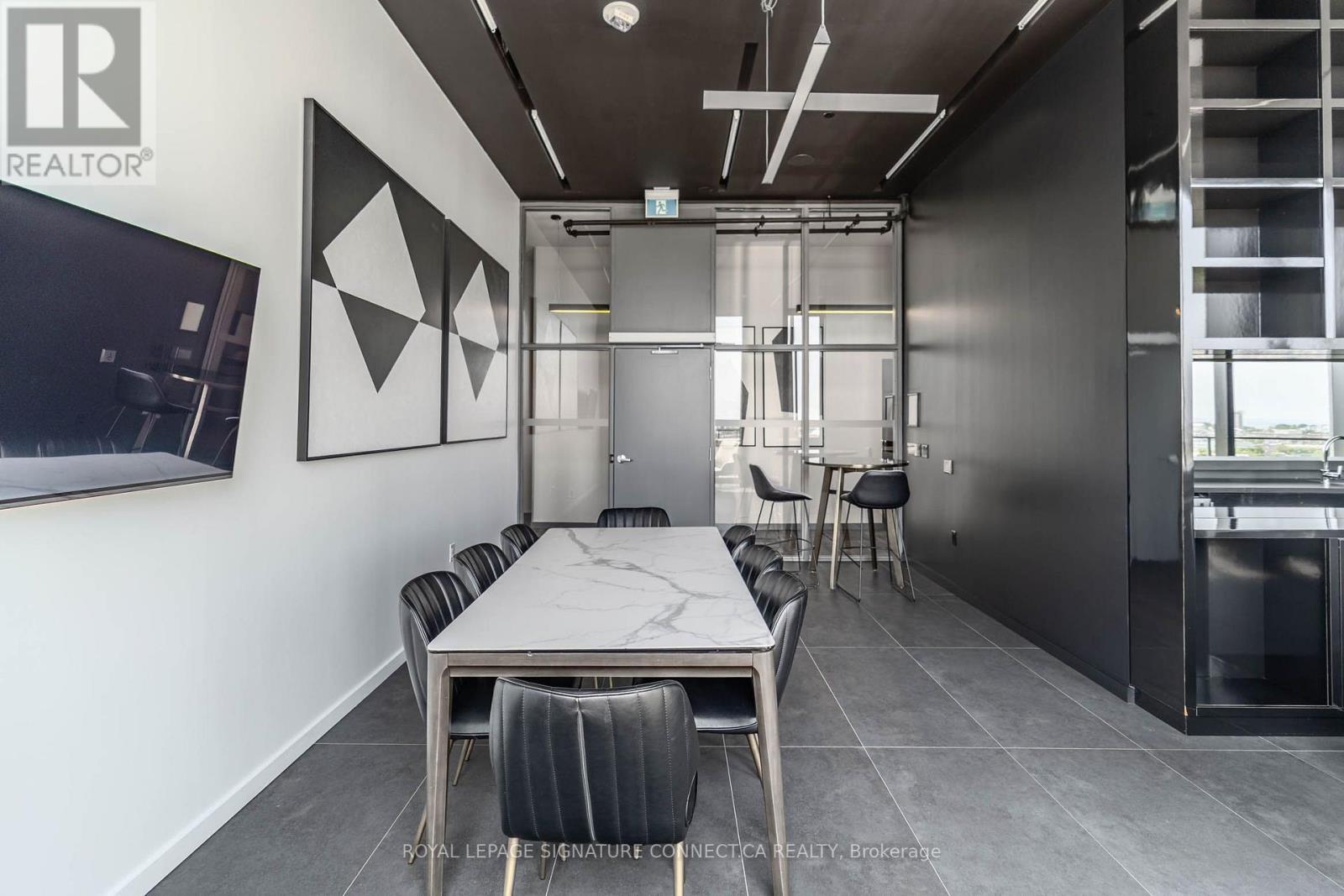 910 - 21 Lawren Harris Square, Toronto, ON - Indoor
