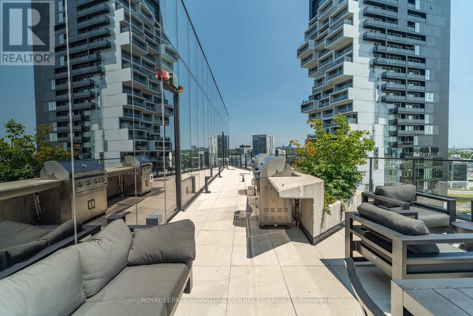 910 - 21 Lawren Harris Square, Toronto, ON - Outdoor