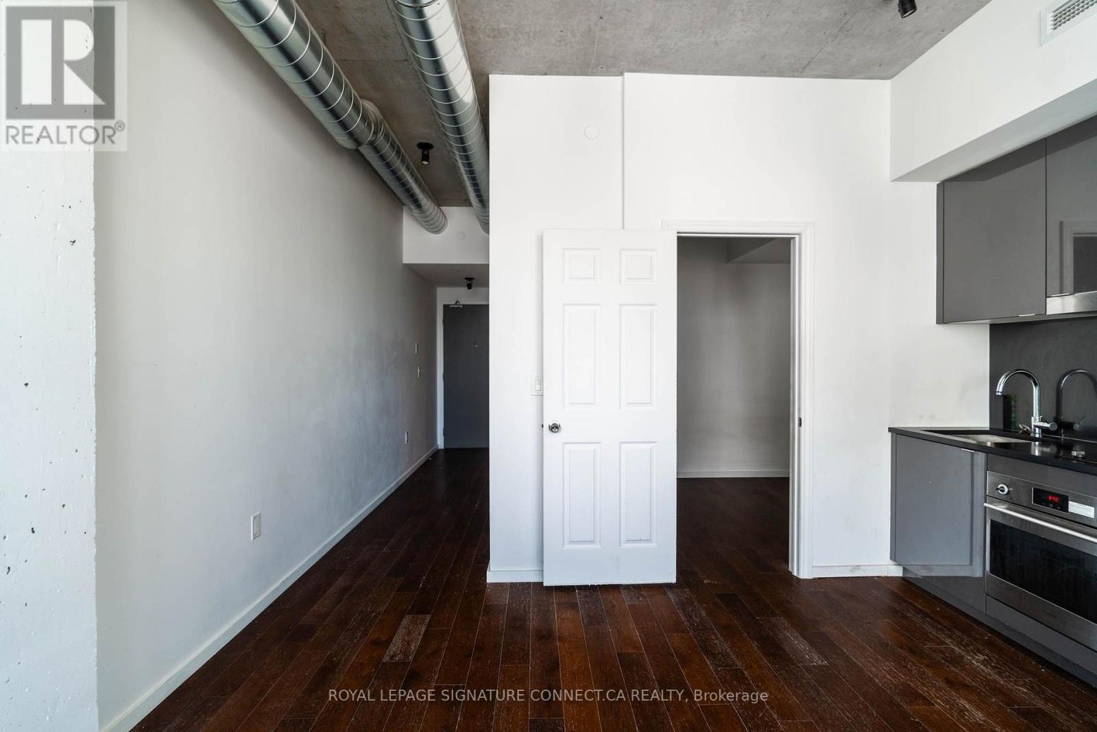 910 - 21 Lawren Harris Square, Toronto, ON - Indoor