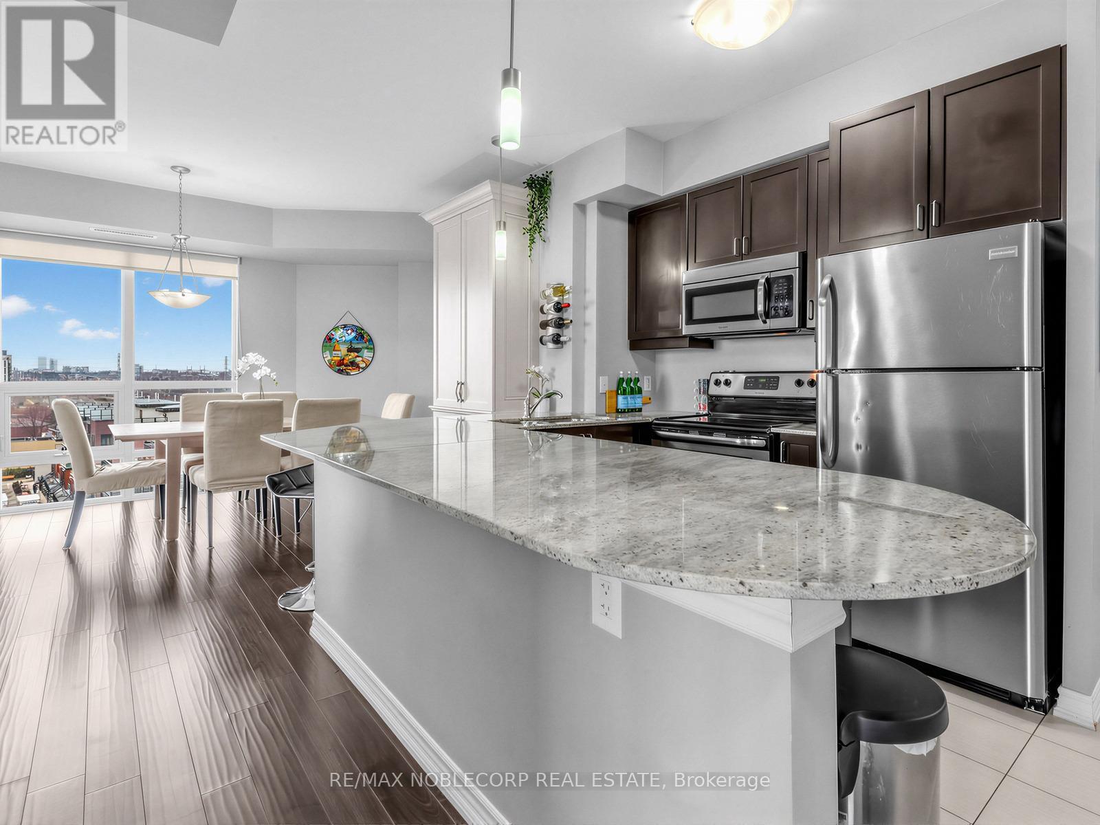 610 - 7730 Kipling Avenue, Vaughan, ON - Indoor Photo Showing Kitchen With Stainless Steel Kitchen With Upgraded Kitchen
