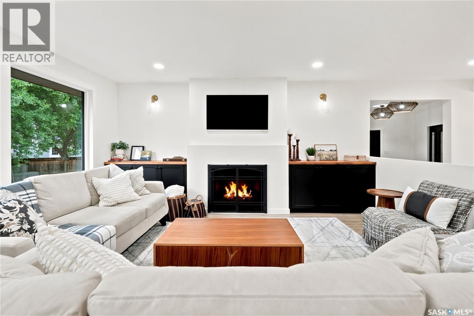 306 Valleyview Boulevard, Caronport, SK - Indoor Photo Showing Living Room With Fireplace
