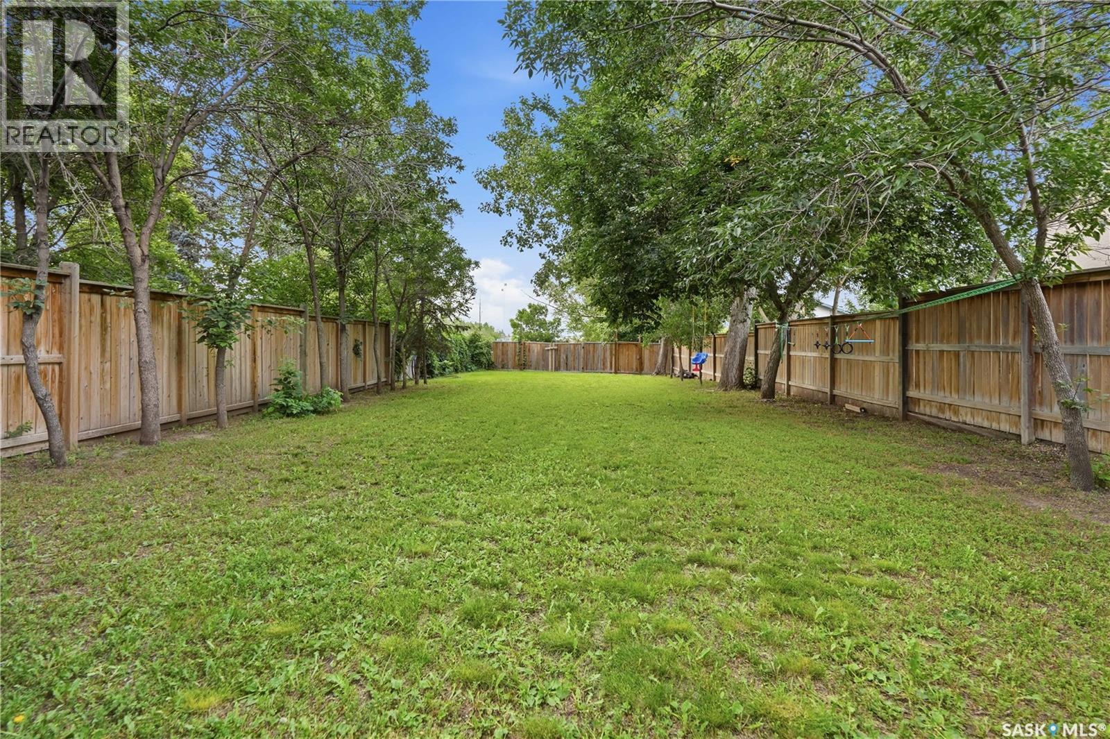 306 Valleyview Boulevard, Caronport, SK - Outdoor With Backyard
