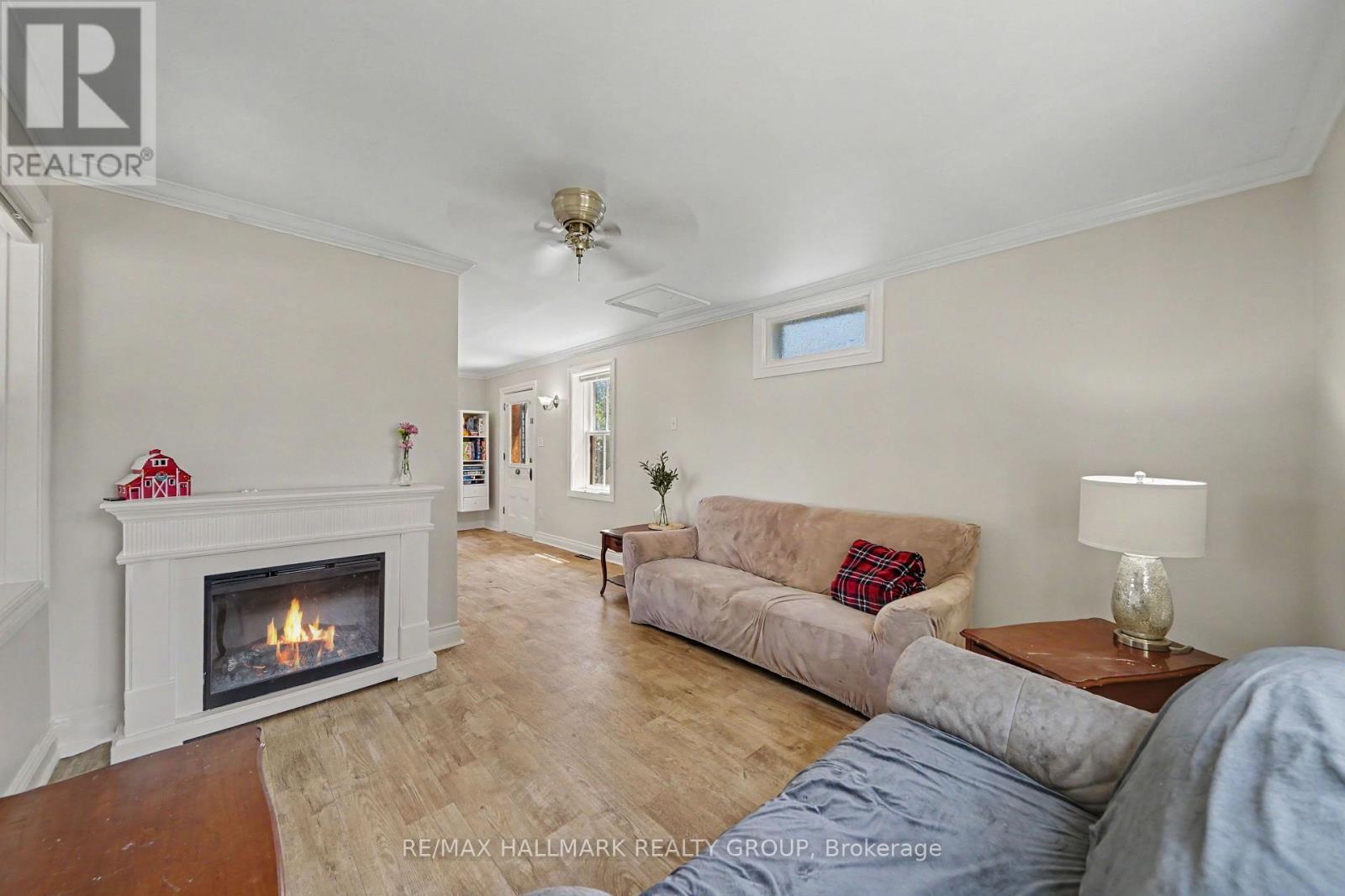 98 Drummond Street E, Perth, ON - Indoor Photo Showing Living Room With Fireplace