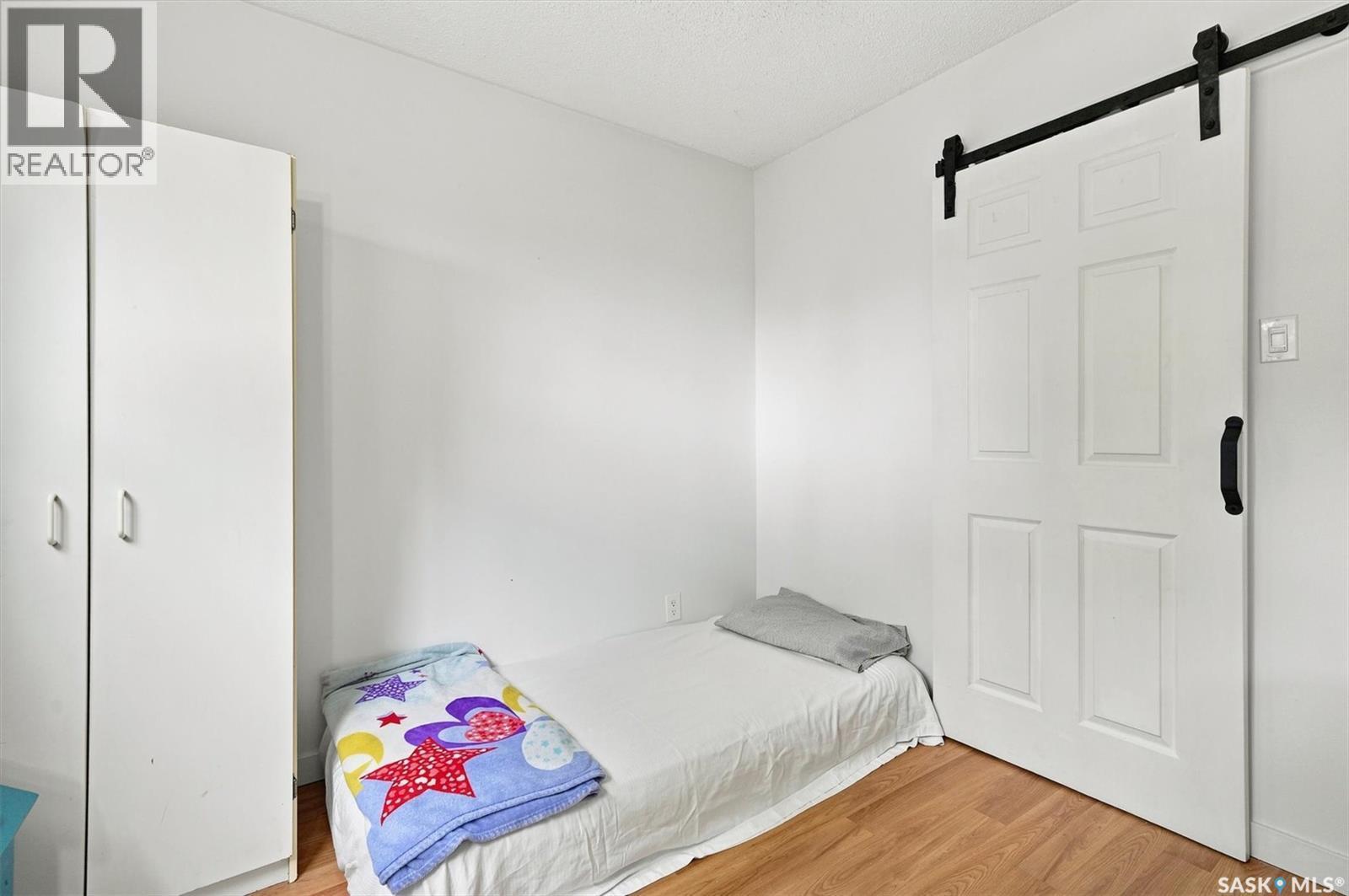 1709 2Nd Avenue N, Saskatoon, SK - Indoor Photo Showing Bedroom