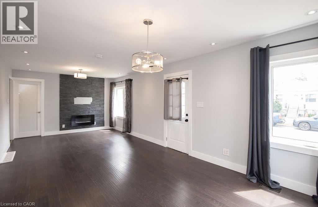 57 Division Street, Hamilton, ON - Indoor Photo Showing Living Room With Fireplace
