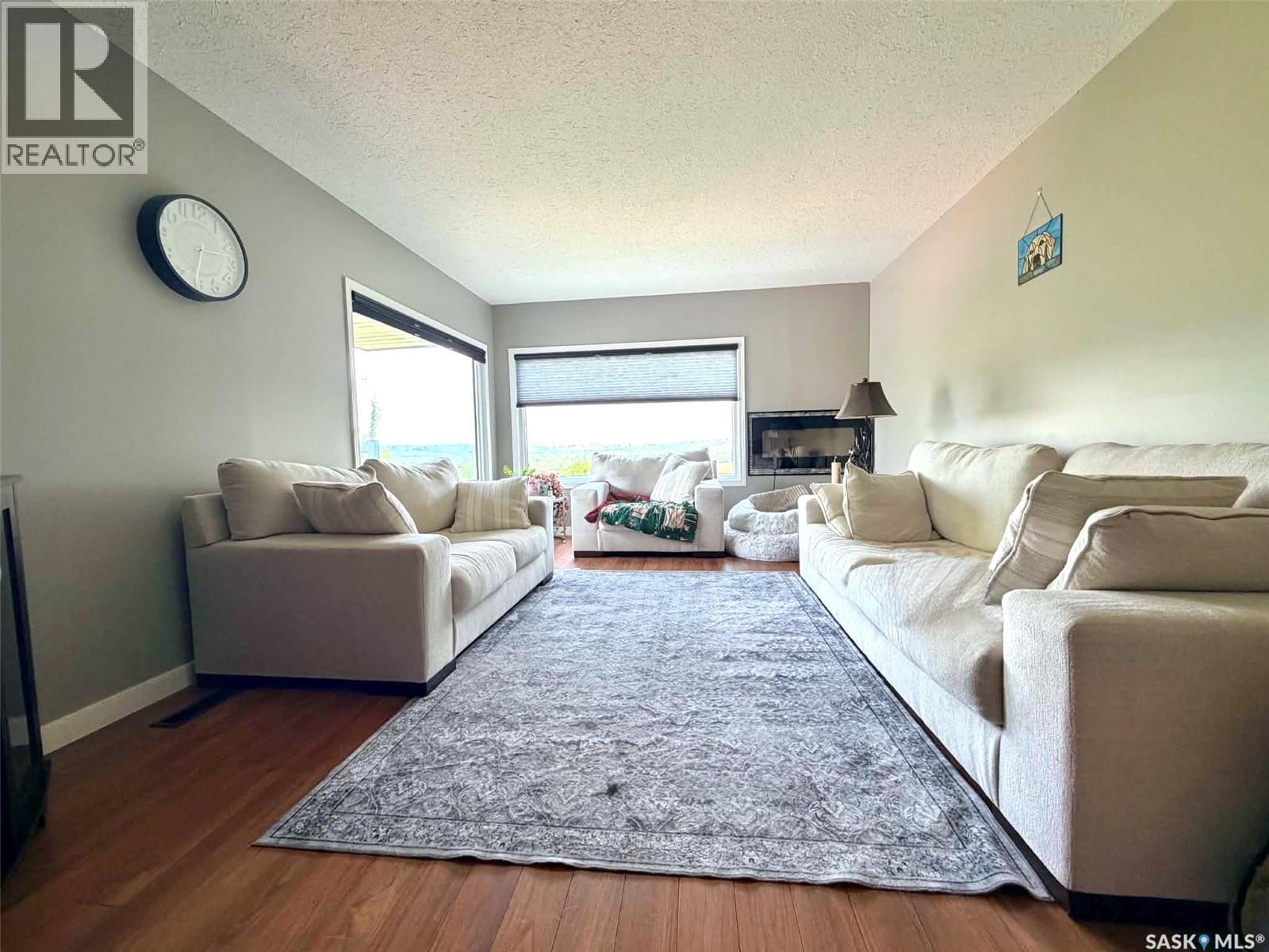 9 1St Avenue, Battleford, SK - Indoor Photo Showing Living Room With Fireplace