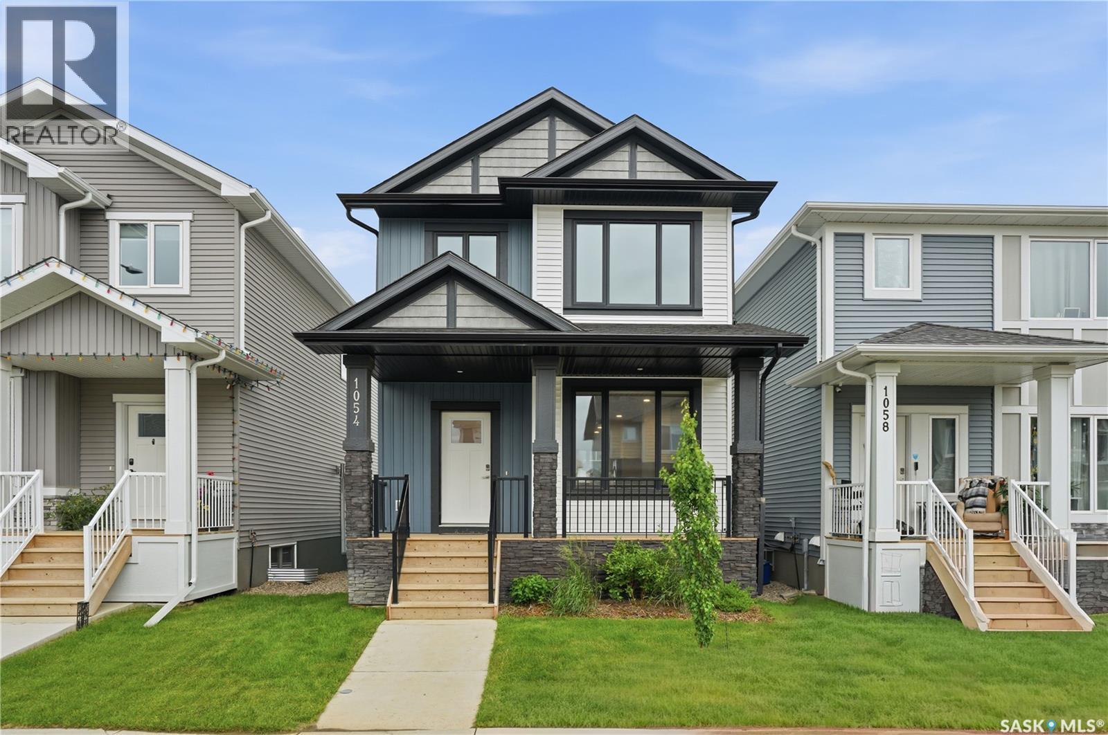 1054 Brighton Gate, Saskatoon, SK - Outdoor With Deck Patio Veranda With Facade