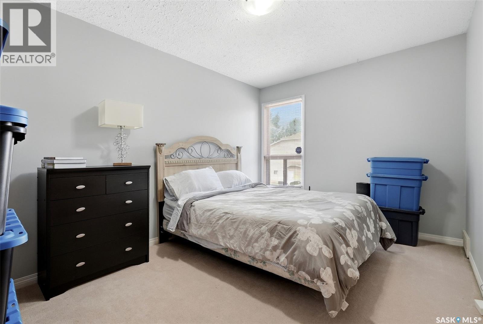 82 Cedar Meadow Drive, Regina, SK - Indoor Photo Showing Bedroom