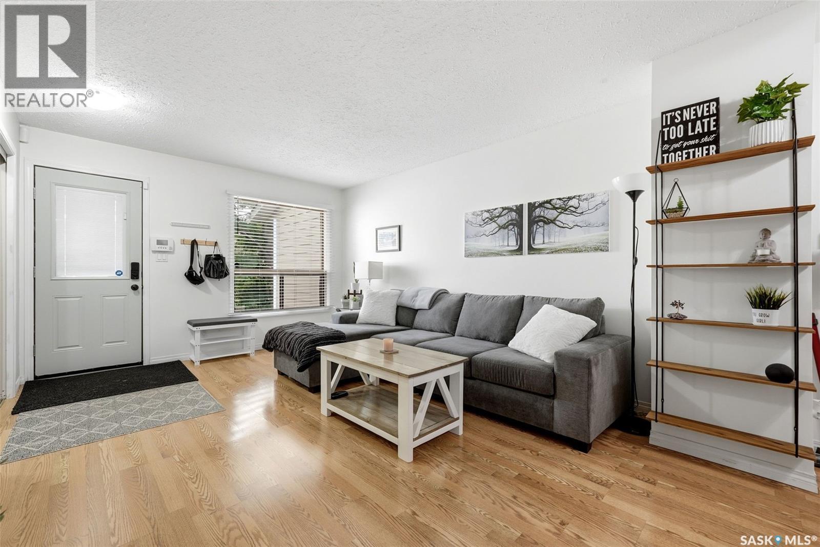 82 Cedar Meadow Drive, Regina, SK - Indoor Photo Showing Living Room