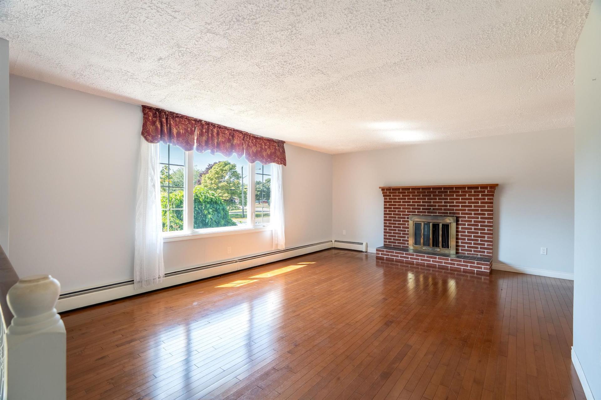37 Chelsey Circle, Charlottetown, PE - Indoor Photo Showing Living Room With Fireplace