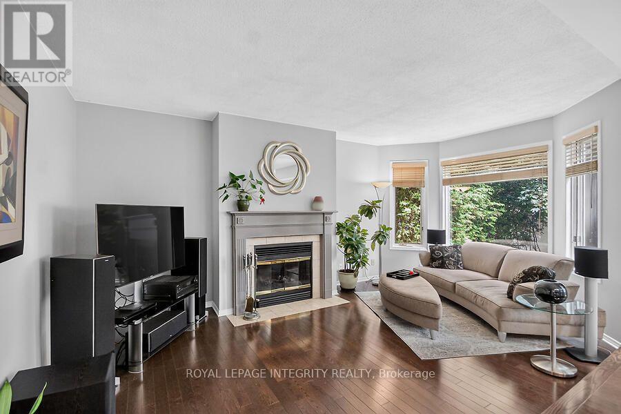 Family room w fireplace - 76 Saddlehorn Crescent, Ottawa, ON - Indoor Photo Showing Living Room With Fireplace