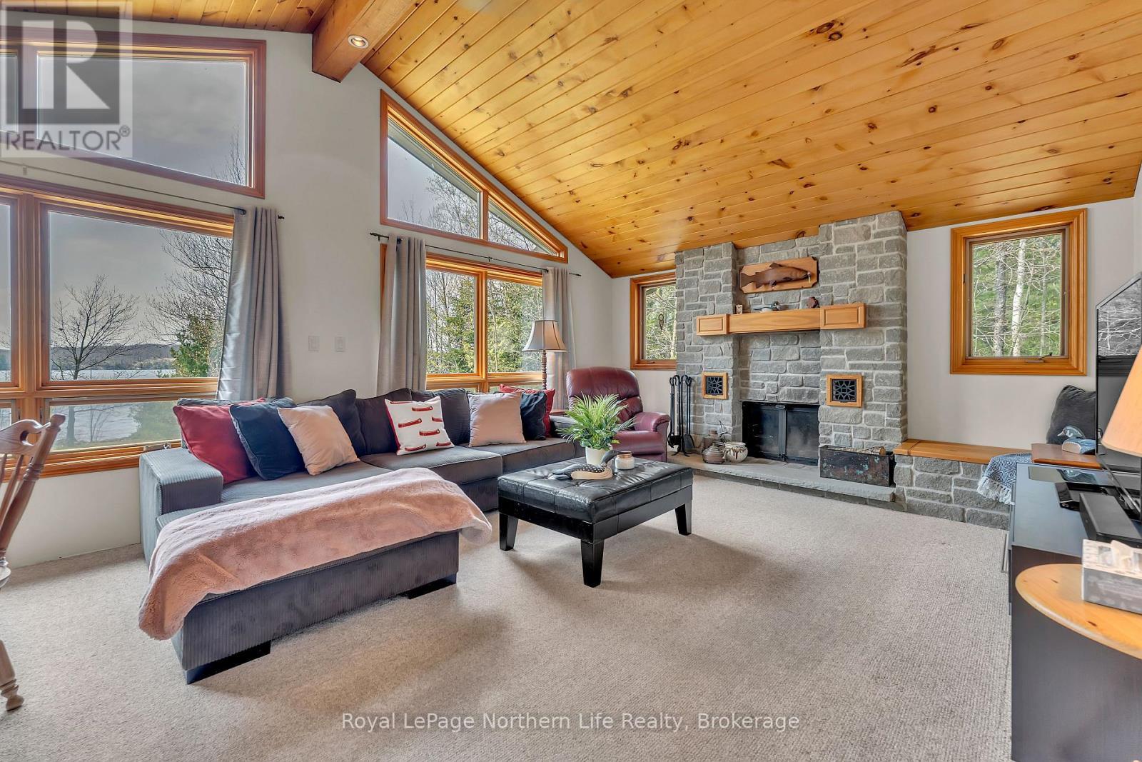 133 Harrison Road, Nipissing, ON - Indoor Photo Showing Living Room With Fireplace