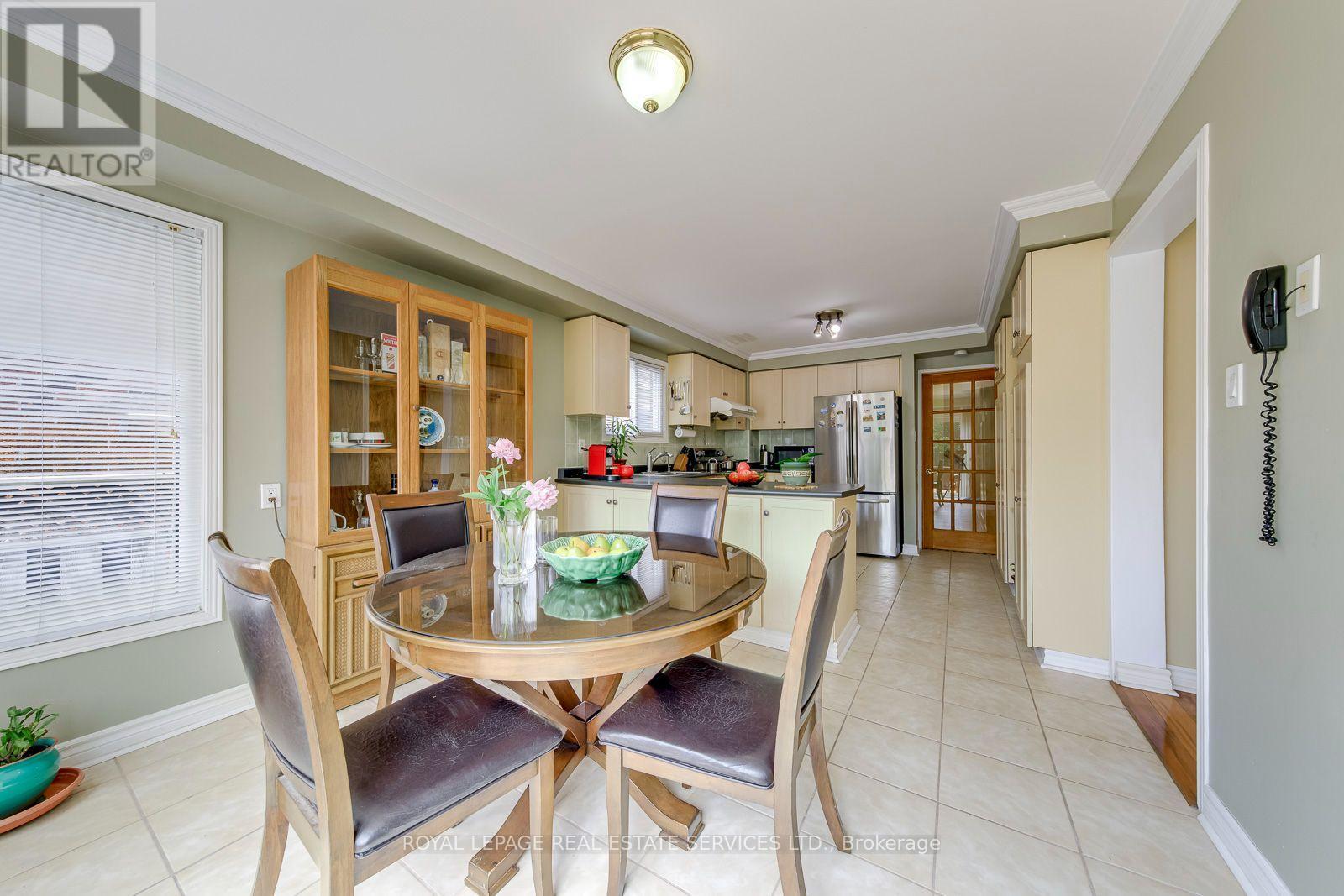 Crown Molding and Open to Kitchen - 3364 Ingram Road, Mississauga, ON - Indoor Photo Showing Dining Room