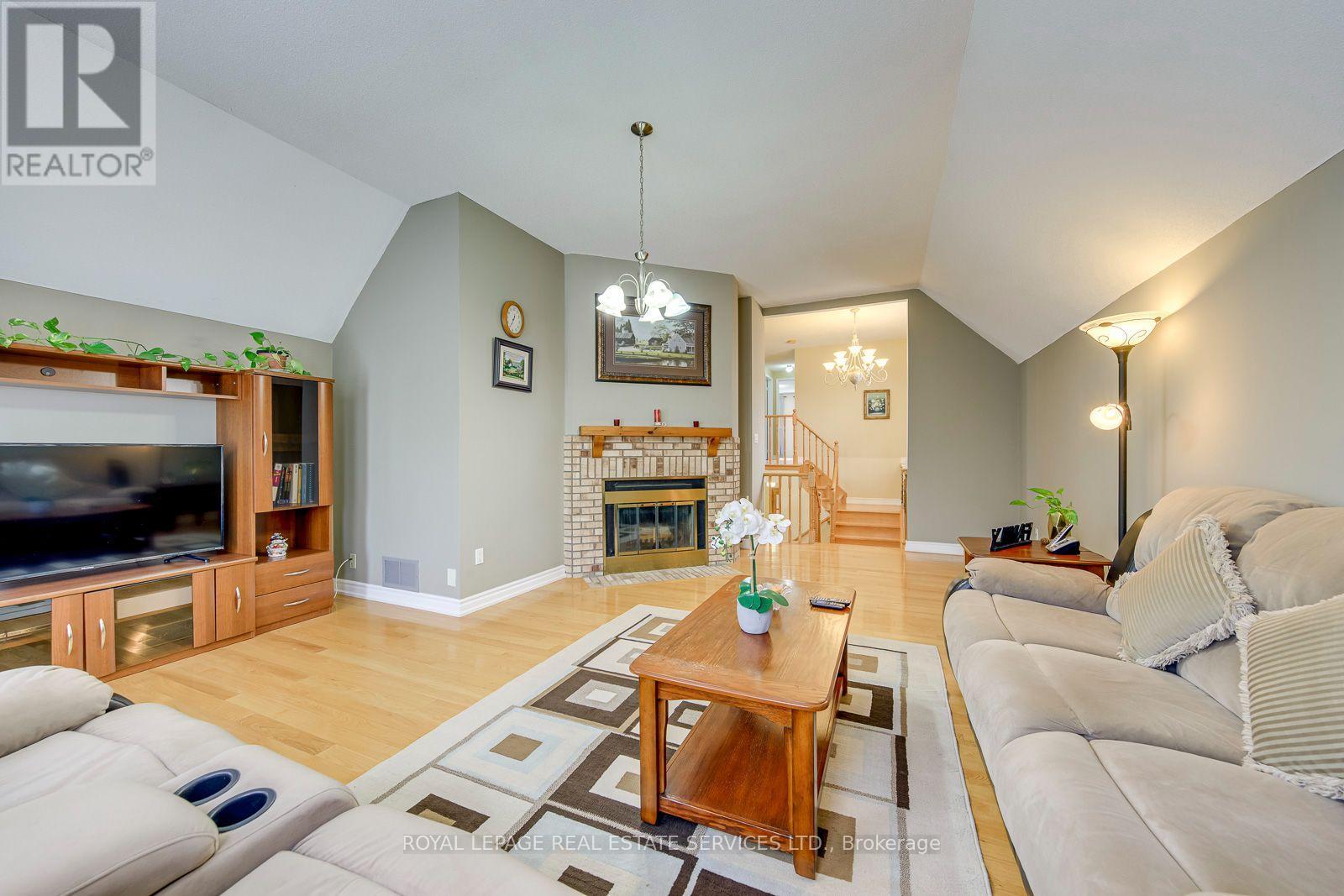Impressive Family Room W/Soaring Cathedral Ceiling - 3364 Ingram Road, Mississauga, ON - Indoor Photo Showing Living Room With Fireplace