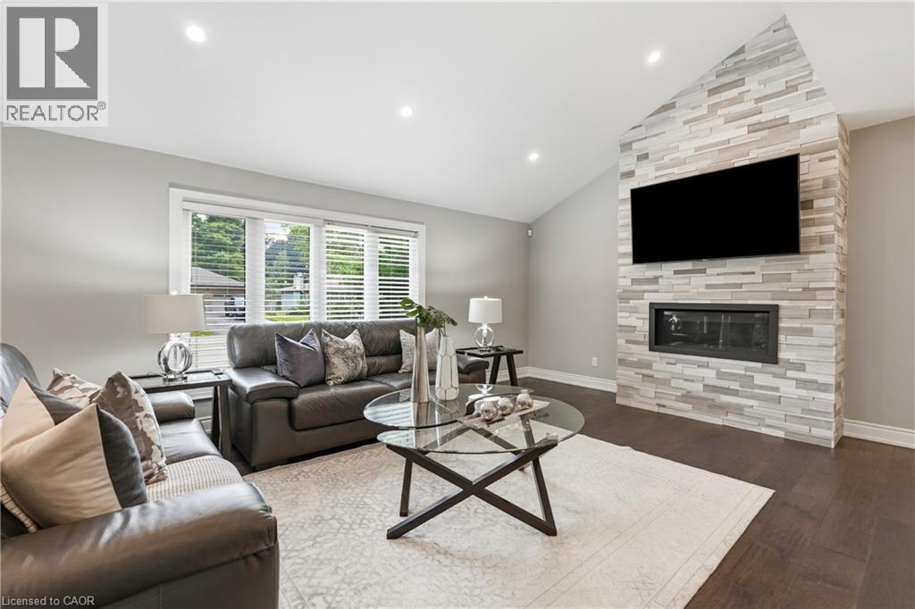 332 Woodworth Drive W, Ancaster, ON - Indoor Photo Showing Living Room With Fireplace