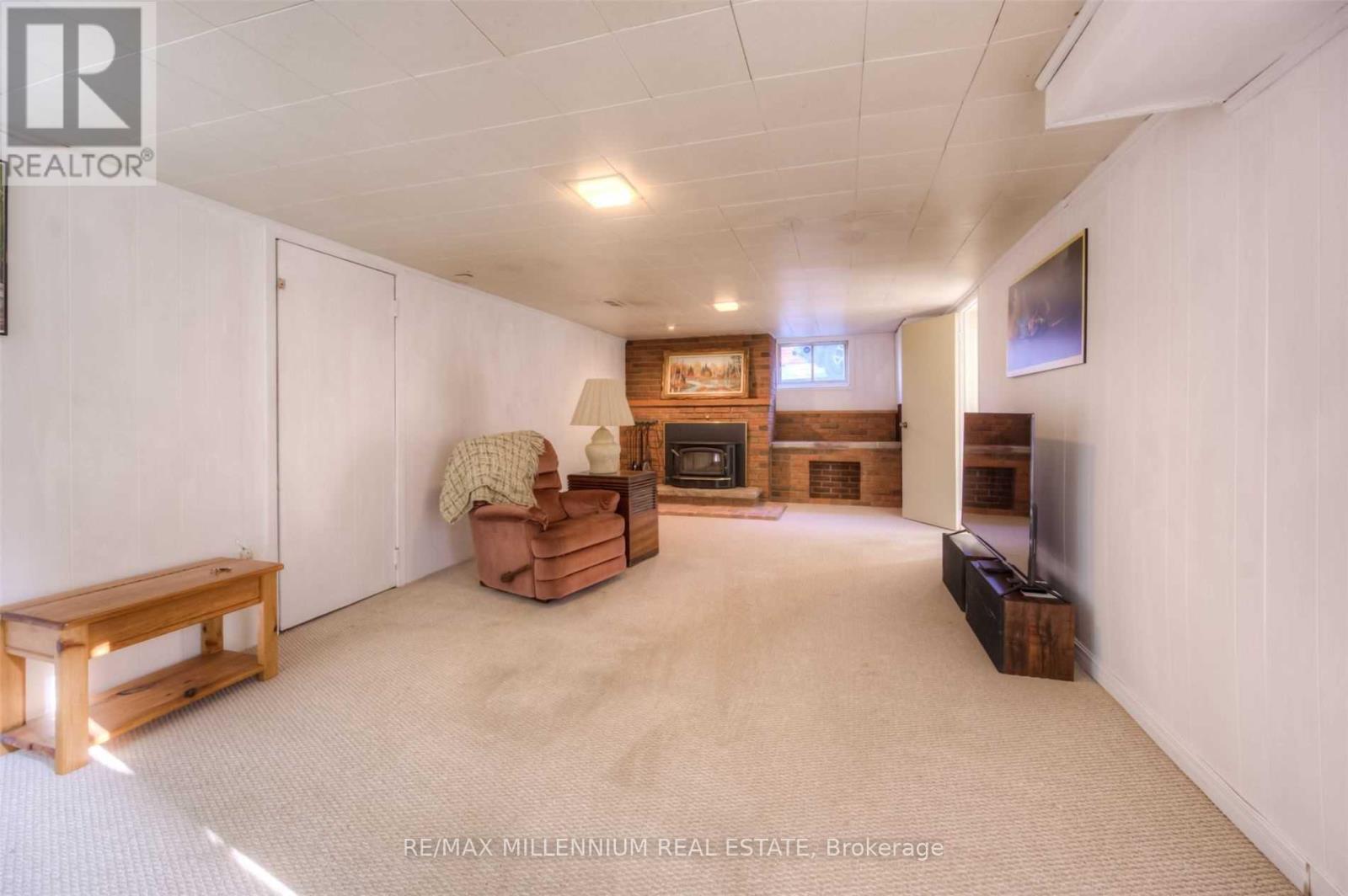 135 Byron Avenue, Kitchener, ON - Indoor Photo Showing Other Room With Fireplace